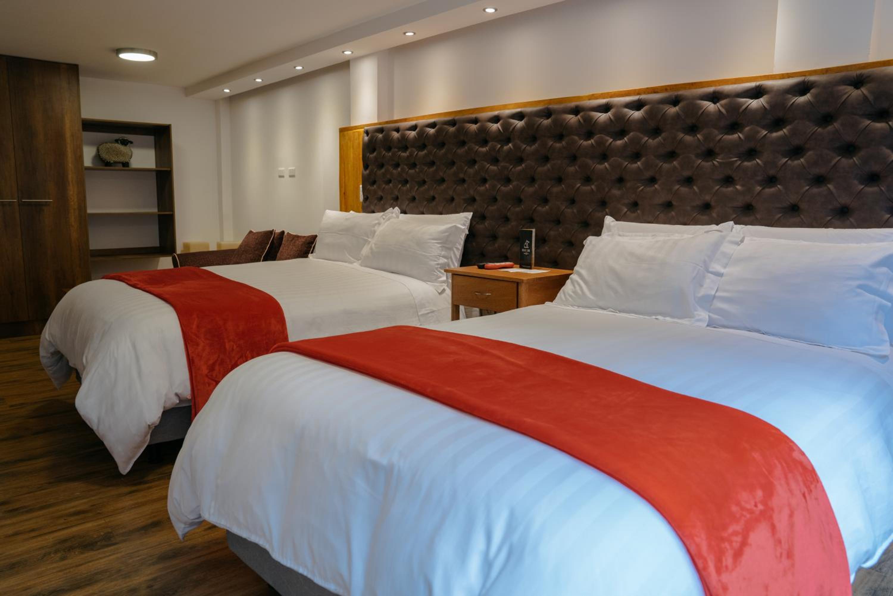 Standard Queen Room with Two Queen Beds photo 2