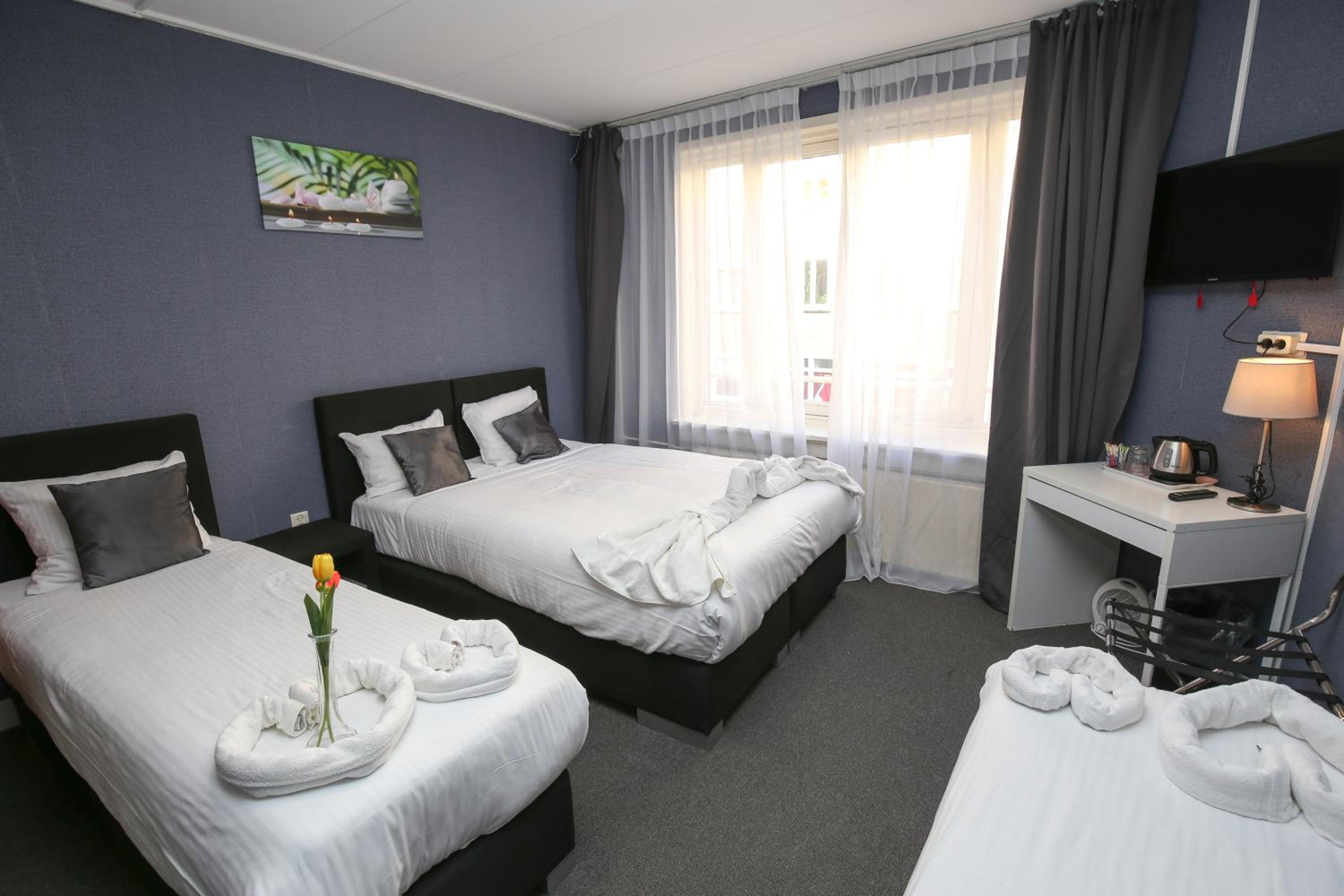 Quadruple Room with Private Bathroom