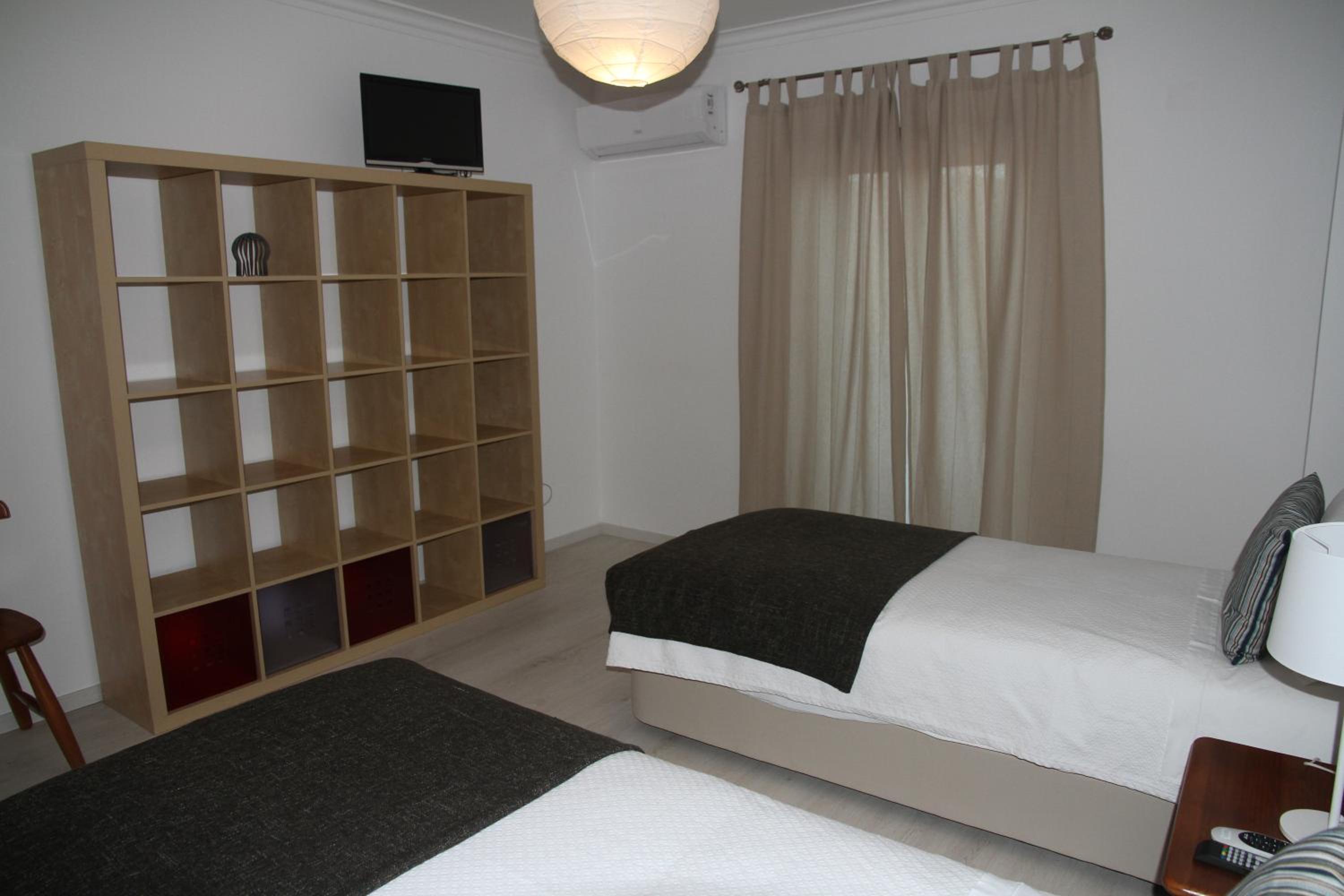 Three-Bedroom Apartment - Photo 12