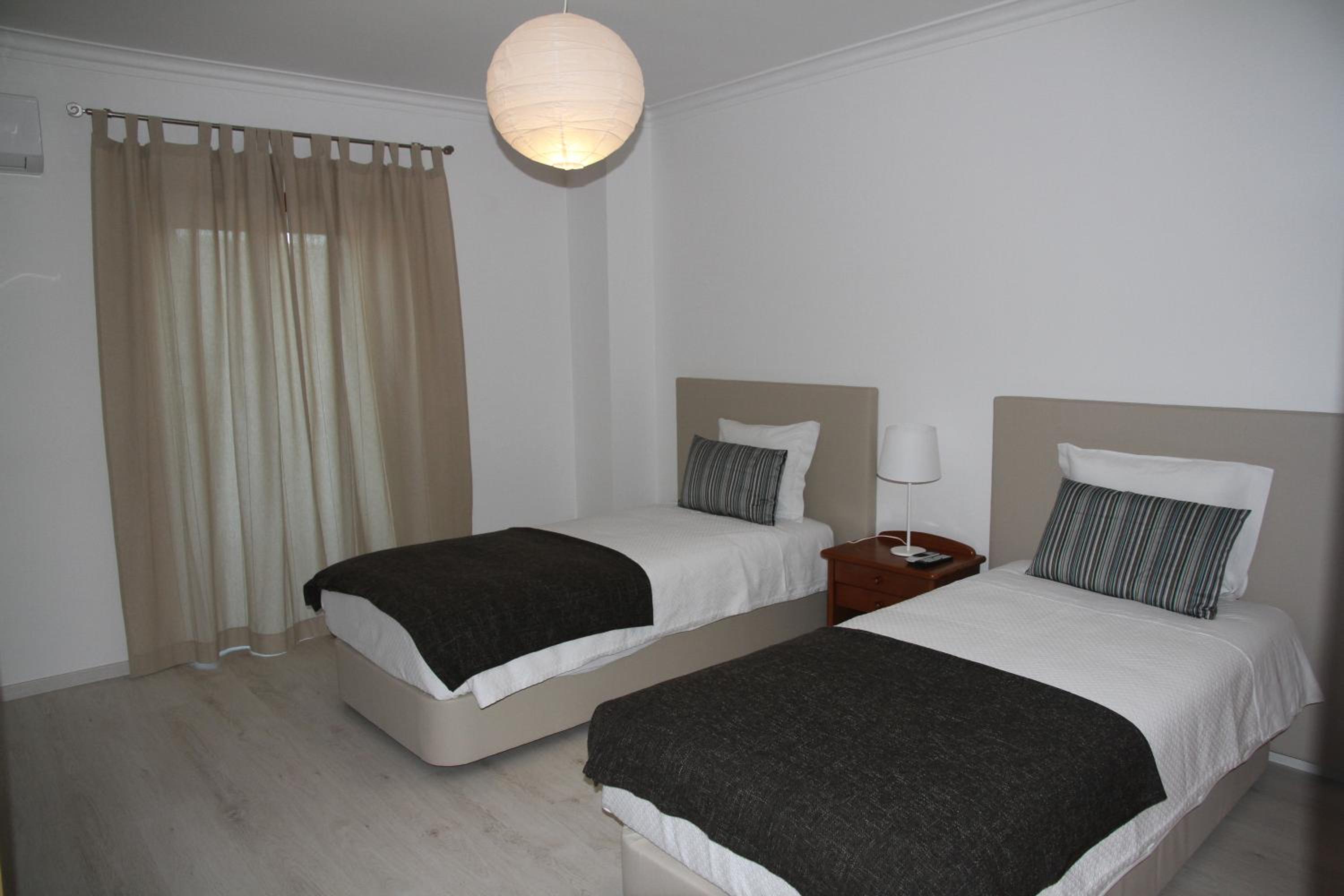 Three-Bedroom Apartment - Photo 2