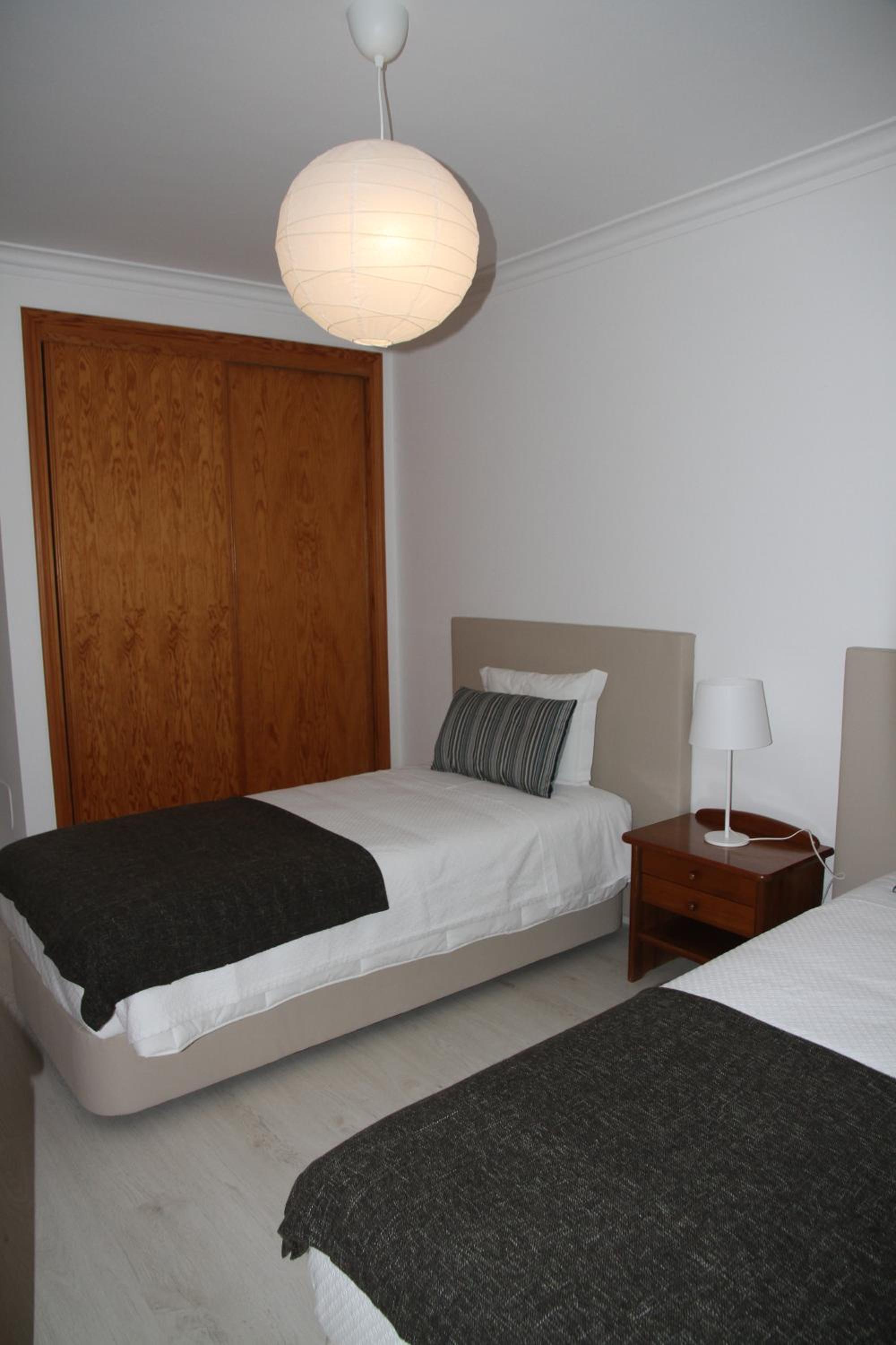 Three-Bedroom Apartment - Photo 9