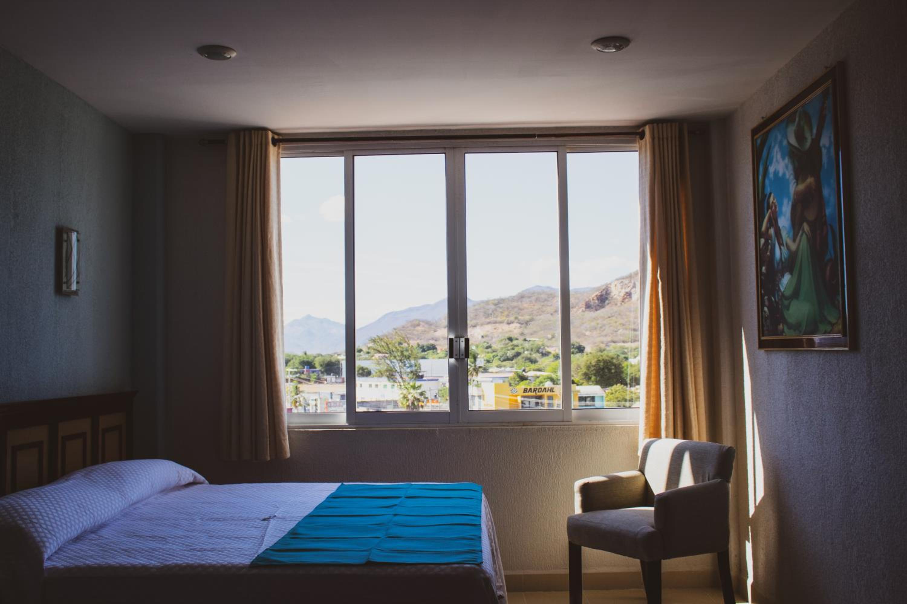 Deluxe Double Room (2 Adults + 1 Child) photo 2