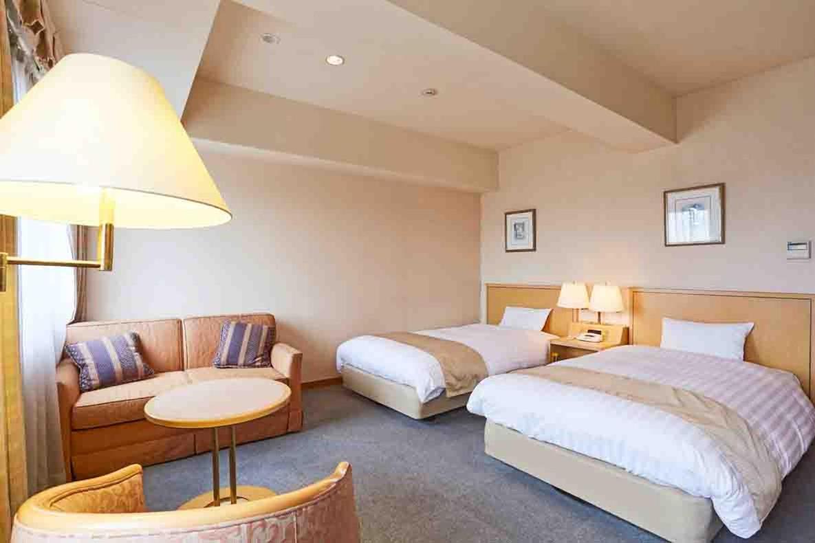 Twin Room - Photo 1