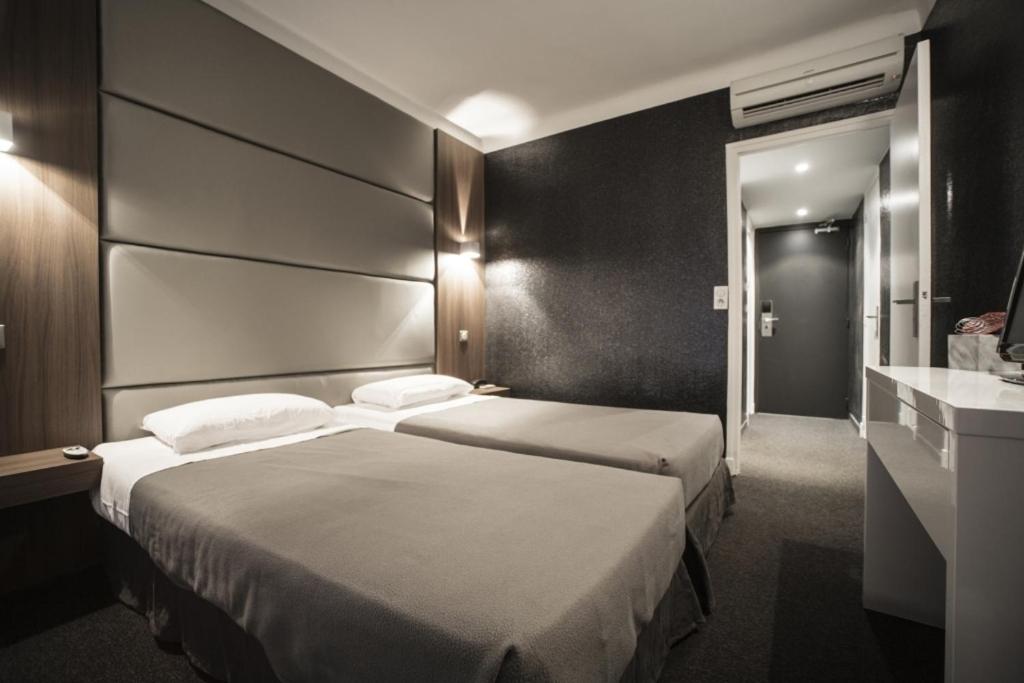 Twin Room - Photo 1
