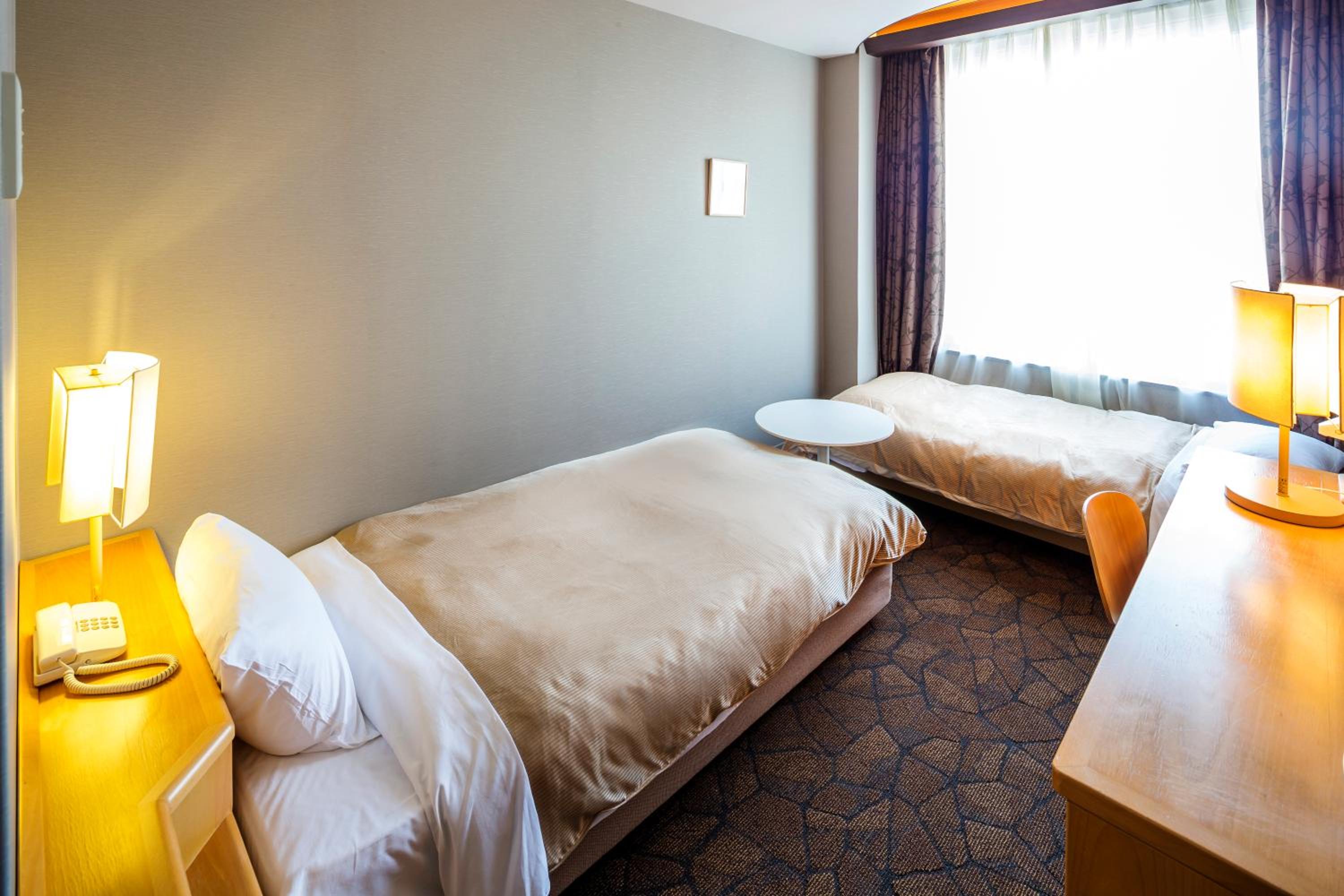 Small Twin Room - Photo 1