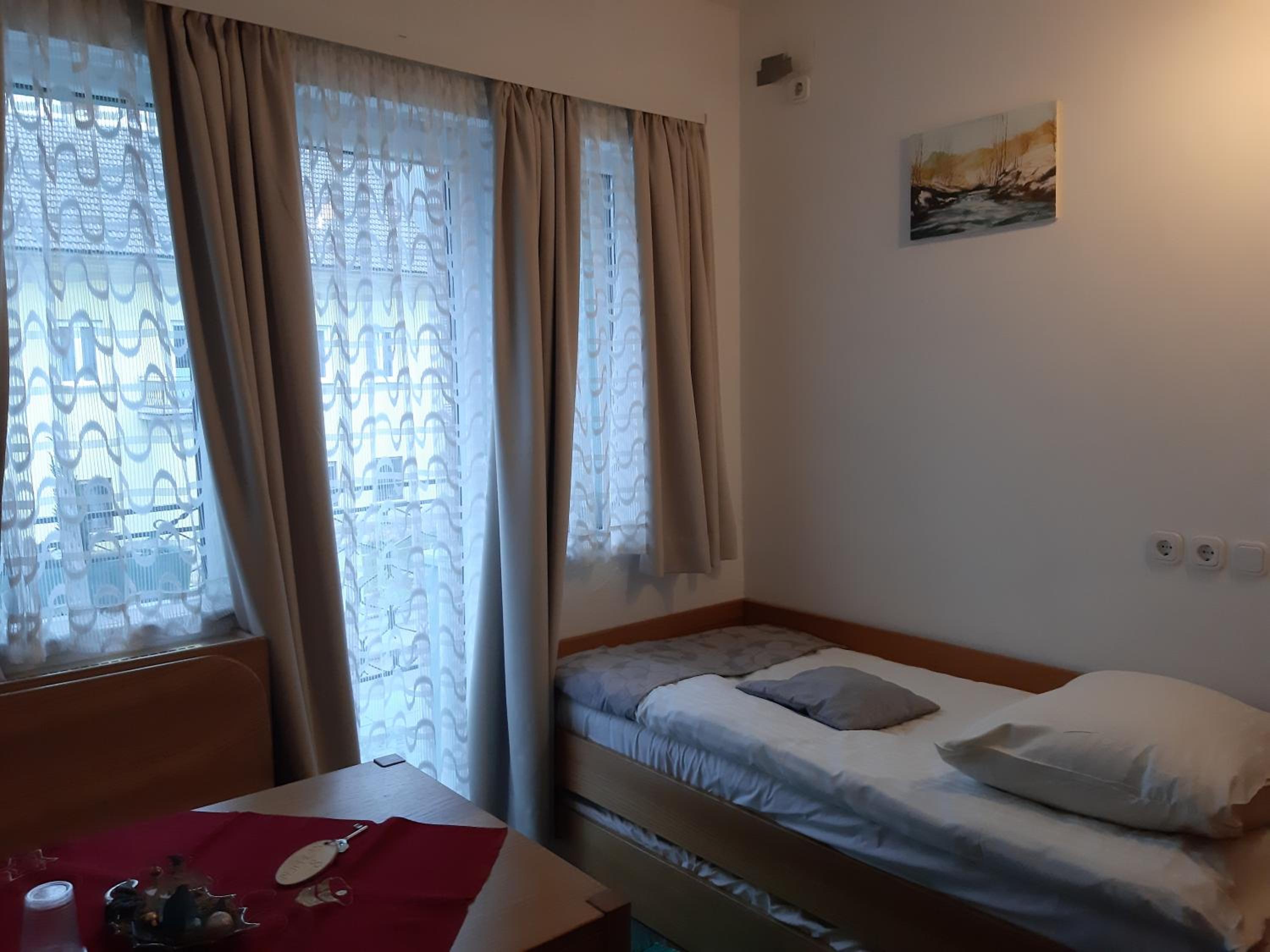 Quadruple Room with Private Bathroom - Photo 1
