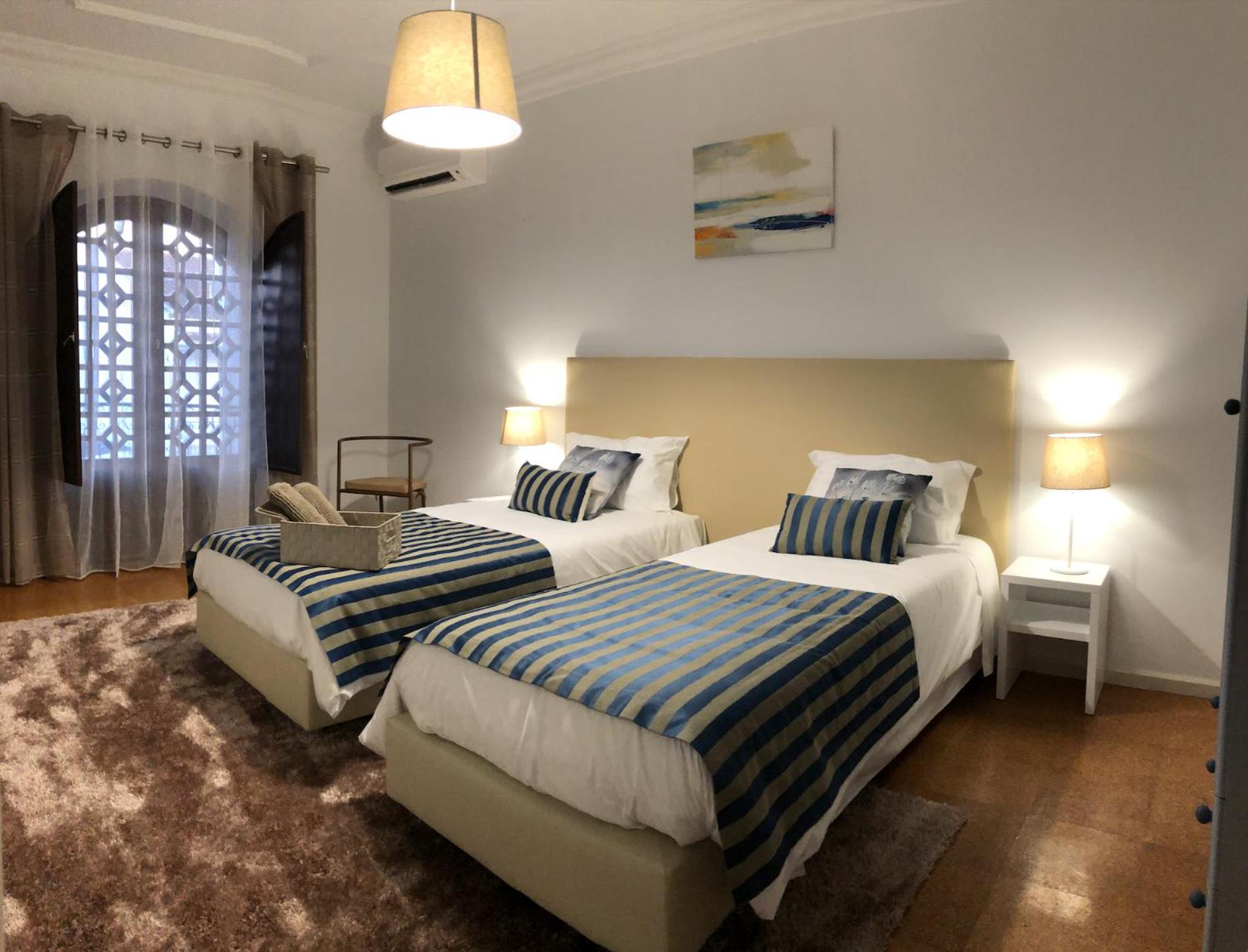 Four-Bedroom House - Photo 43