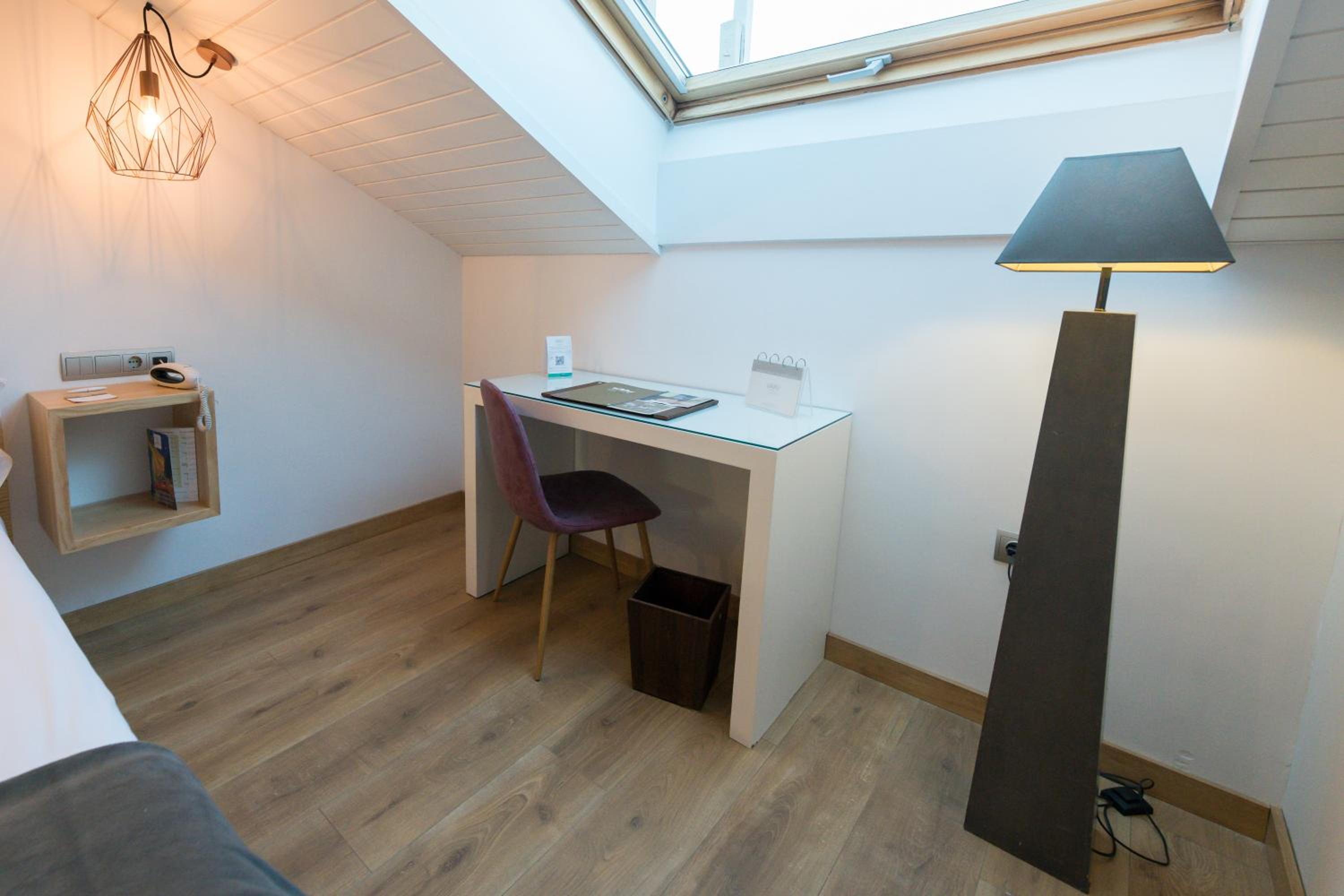 Habitación Doble con Sofá Cama
