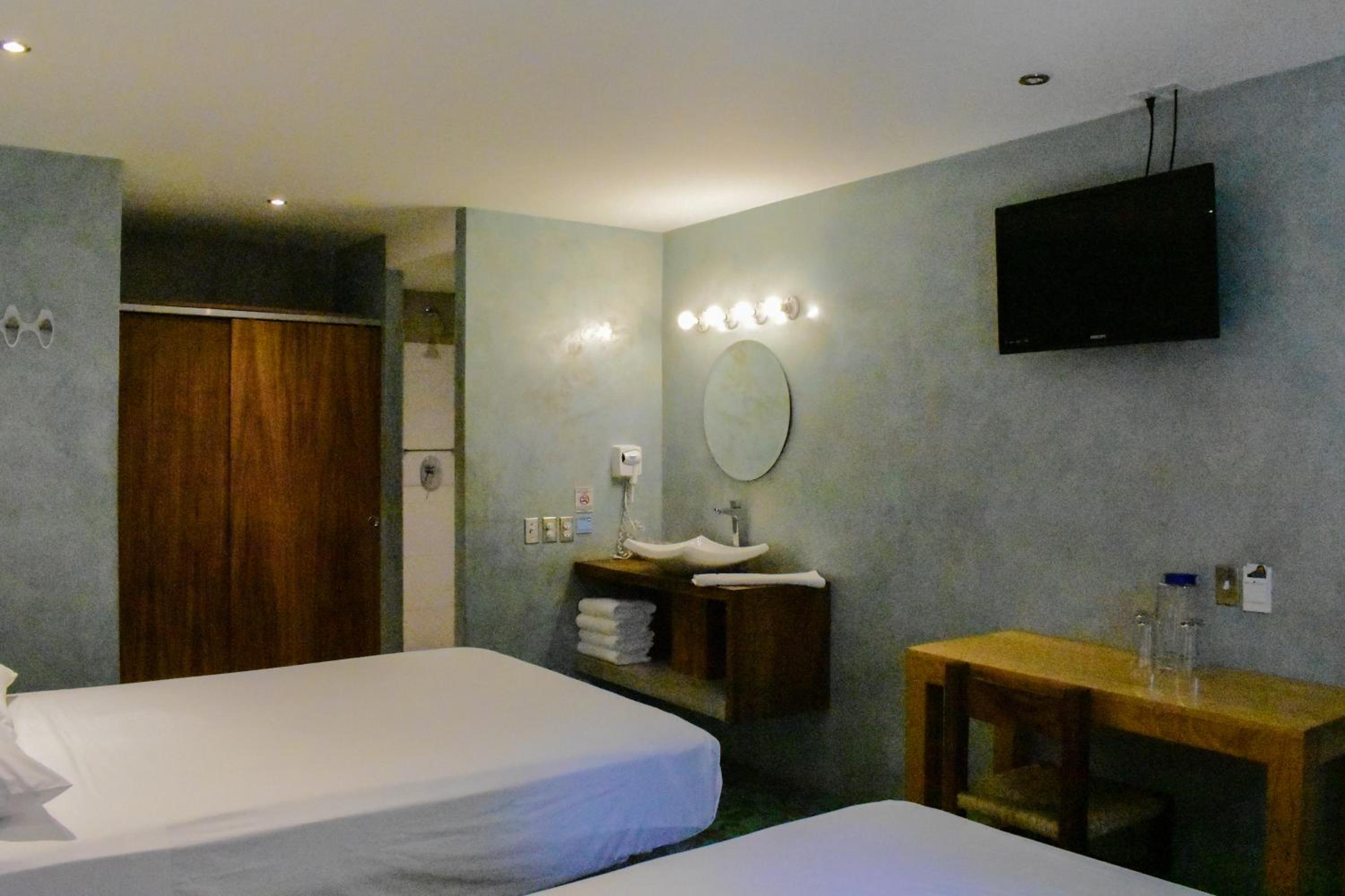 Deluxe Quadruple Room - Photo 3