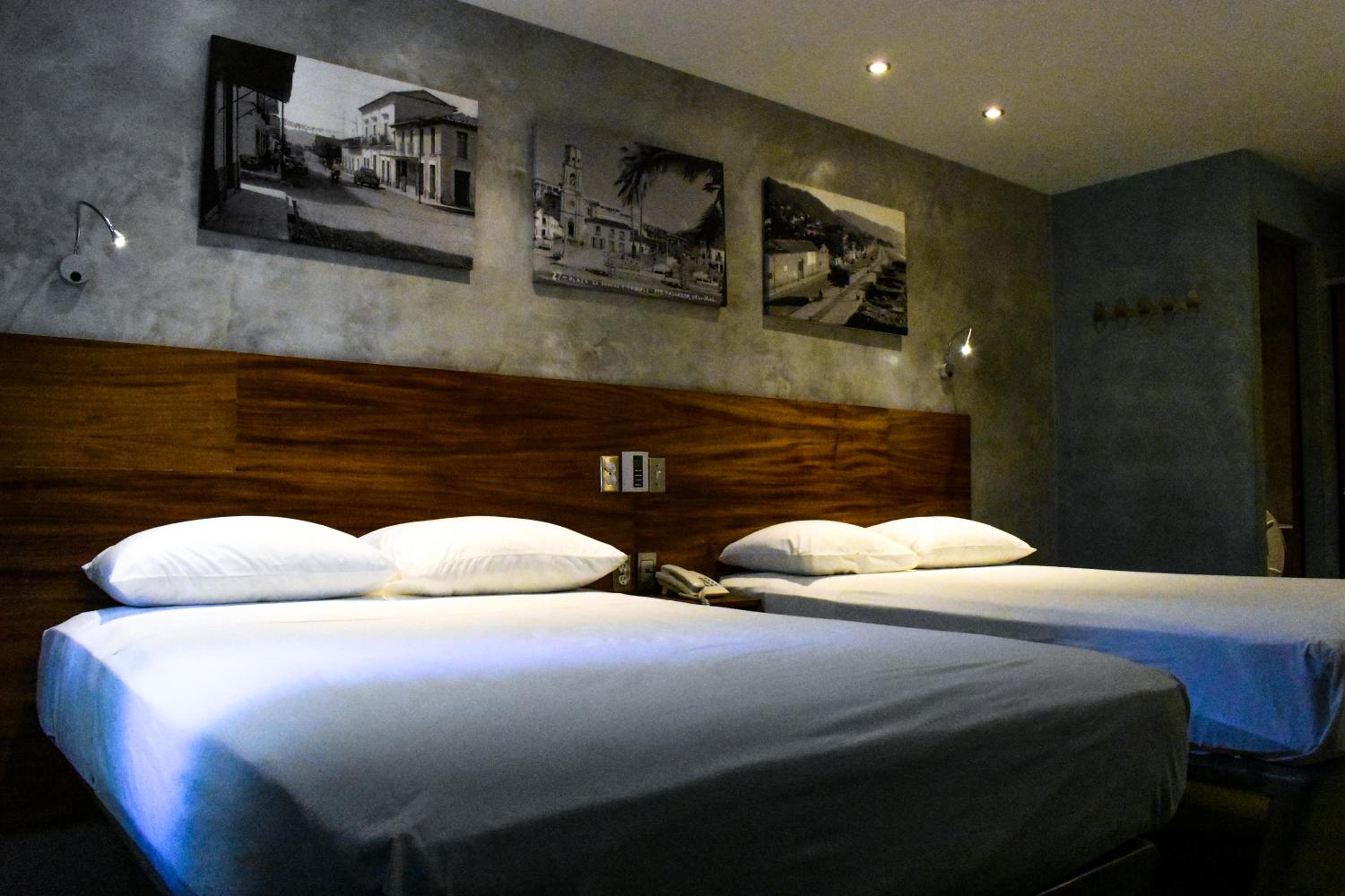 Deluxe Quadruple Room - Photo 1