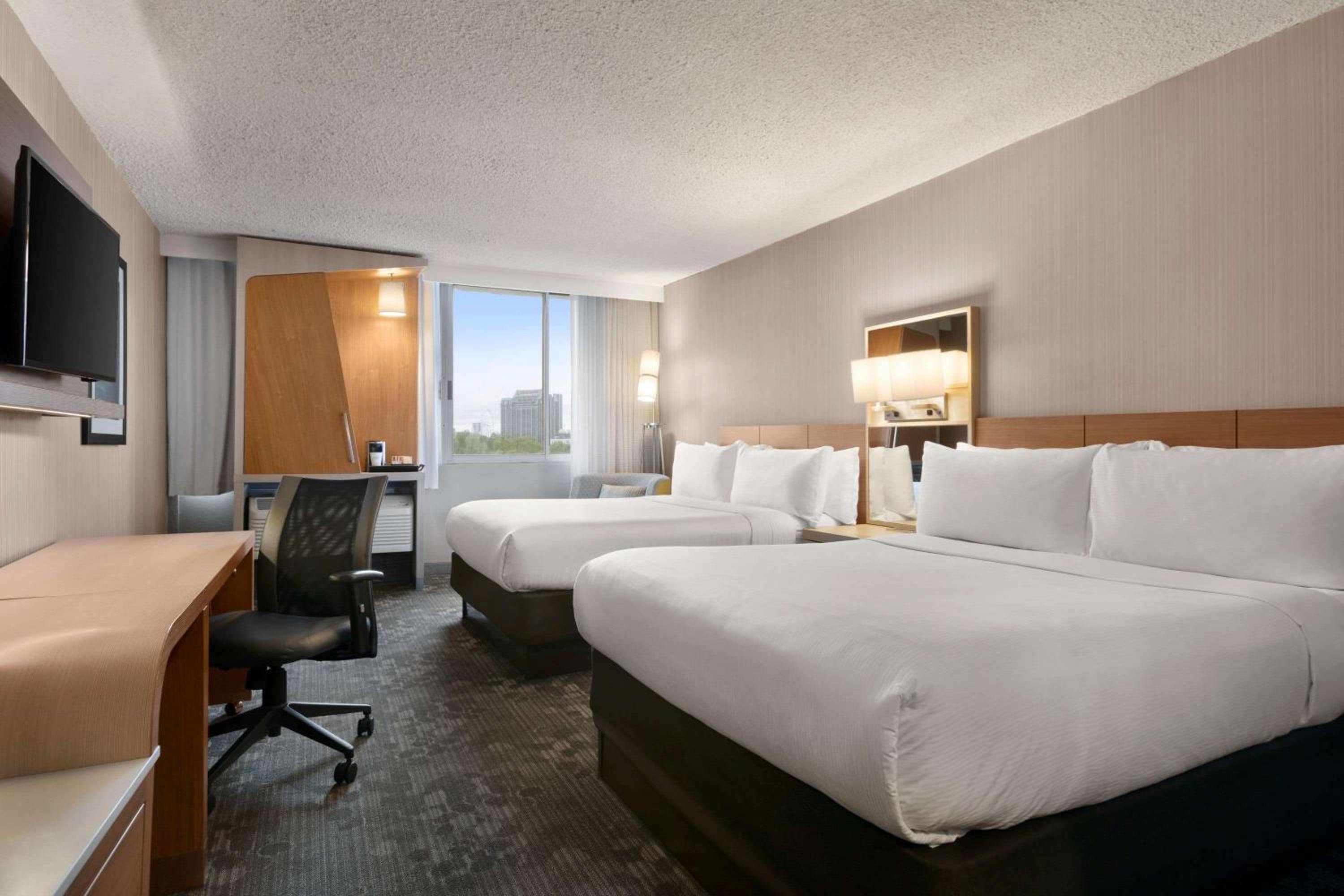 Deluxe Queen Room with Two Queen Beds - Photo 1