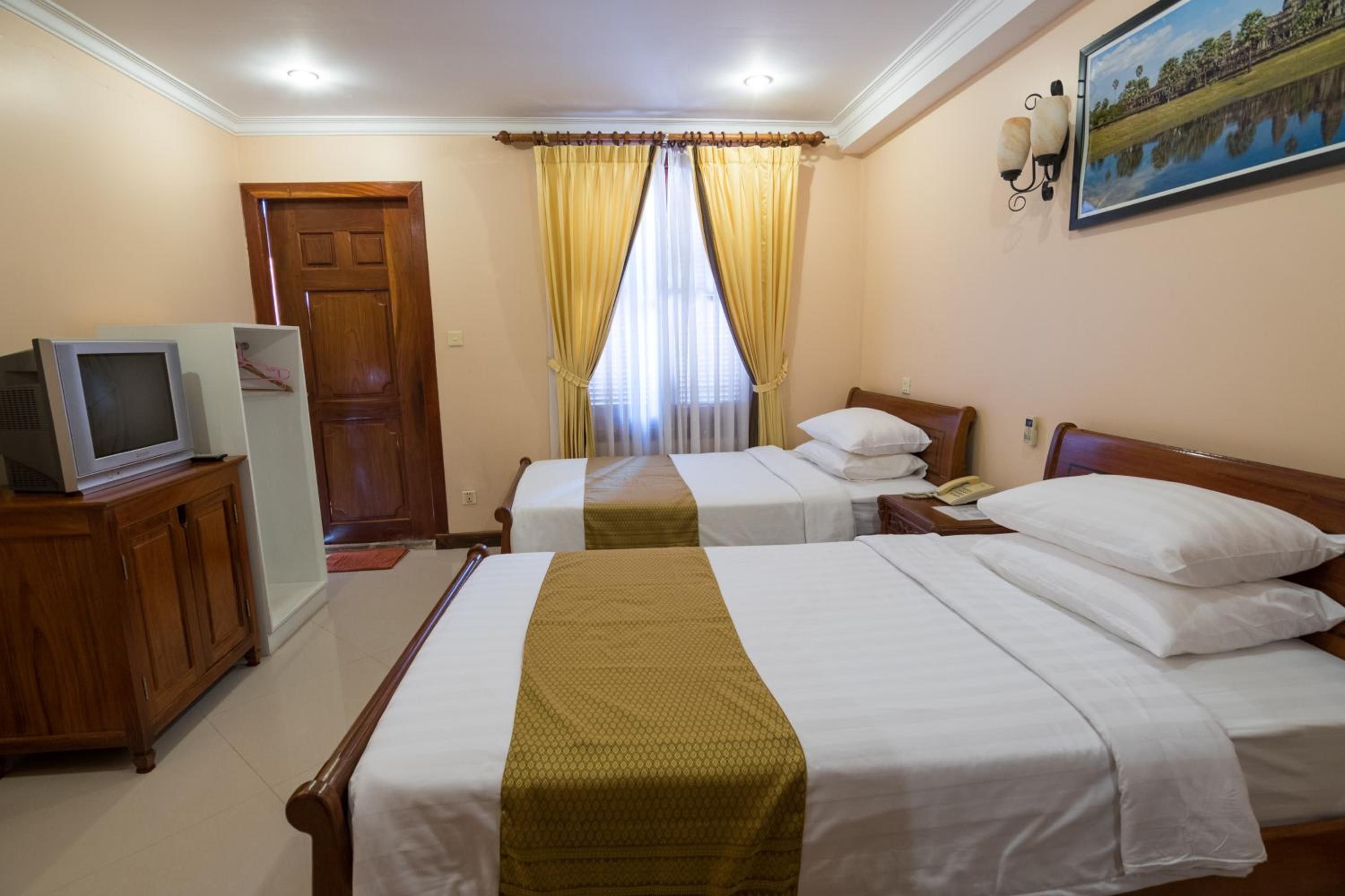 Deluxe Twin Room - Photo 9