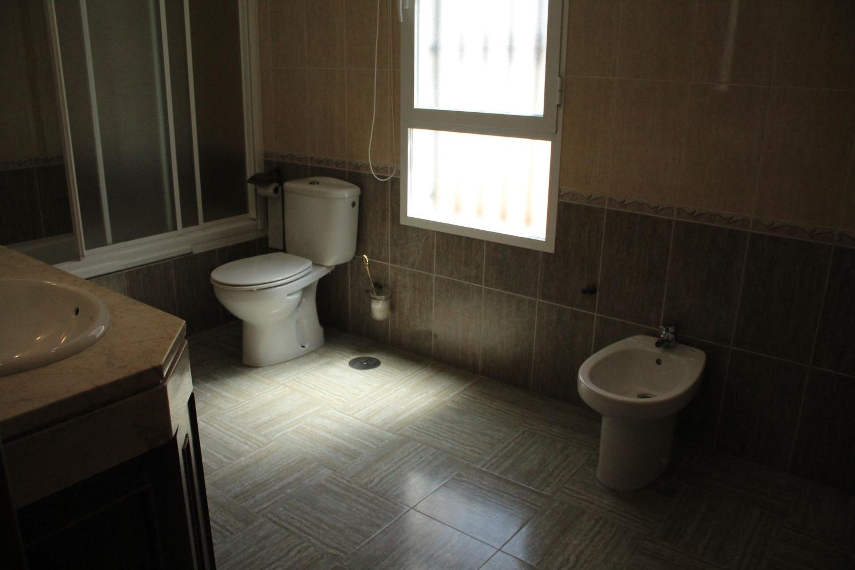 Three-Bedroom House photo 3