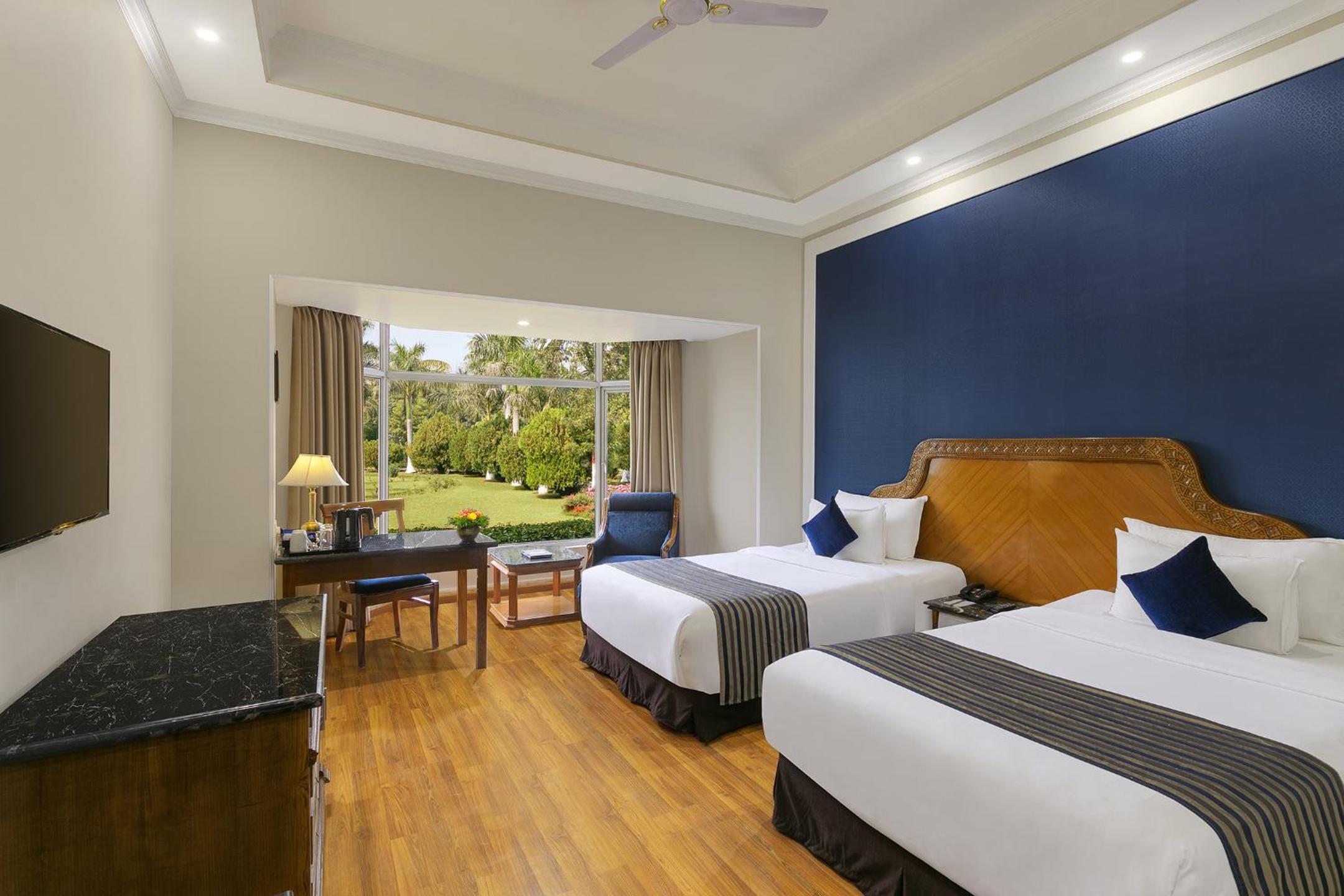 Deluxe Twin Room at Ramada Khajuraho Deluxe Twin Room at Ramada Khajuraho