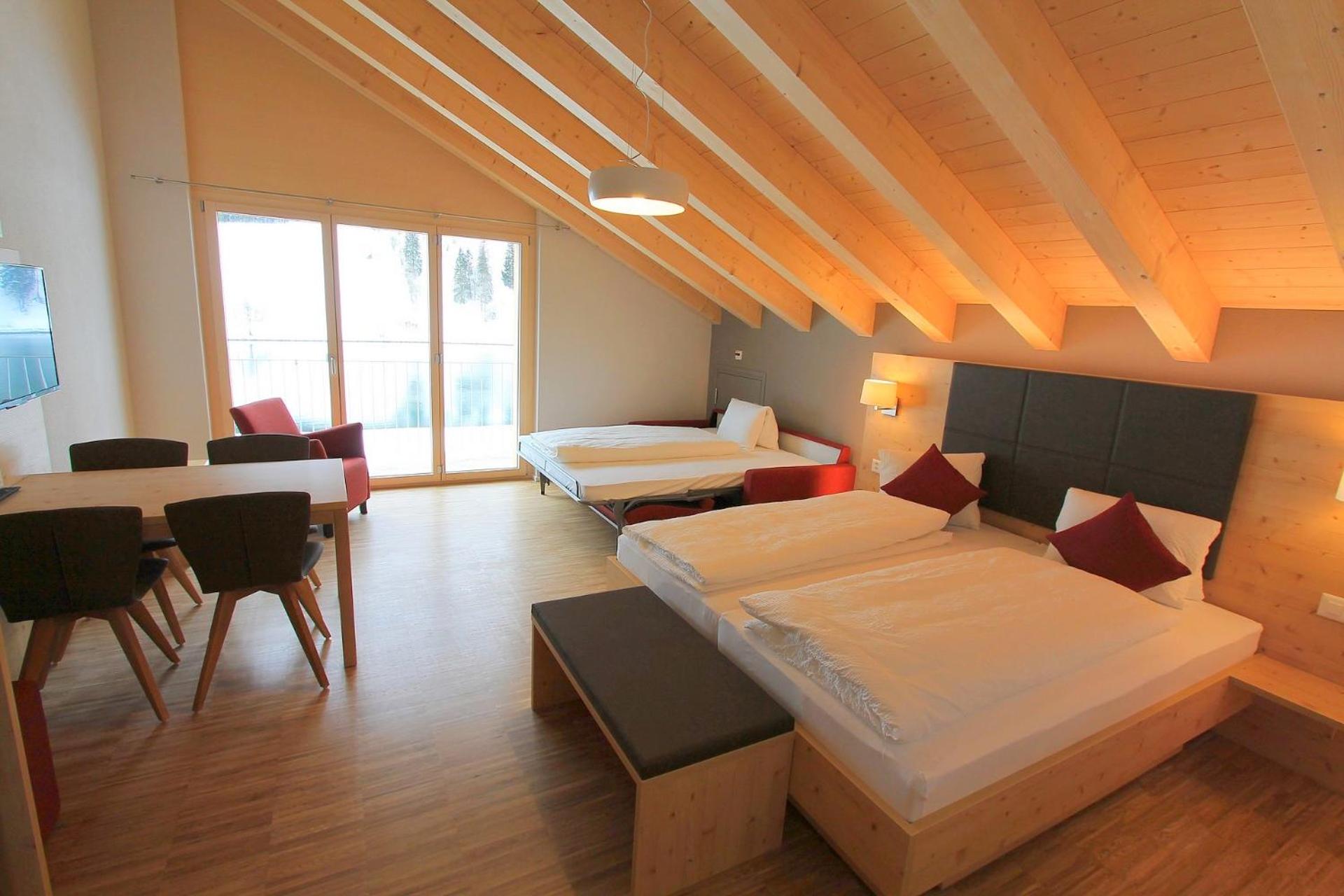Family Room with Balcony - Photo 2