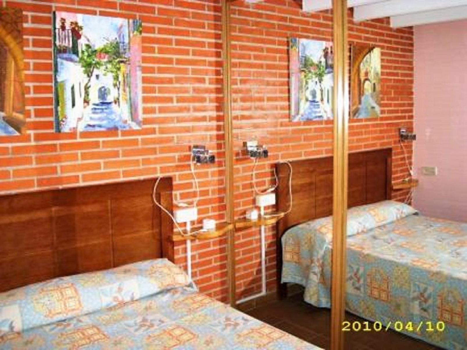 Casa adosada de tres habitaciones