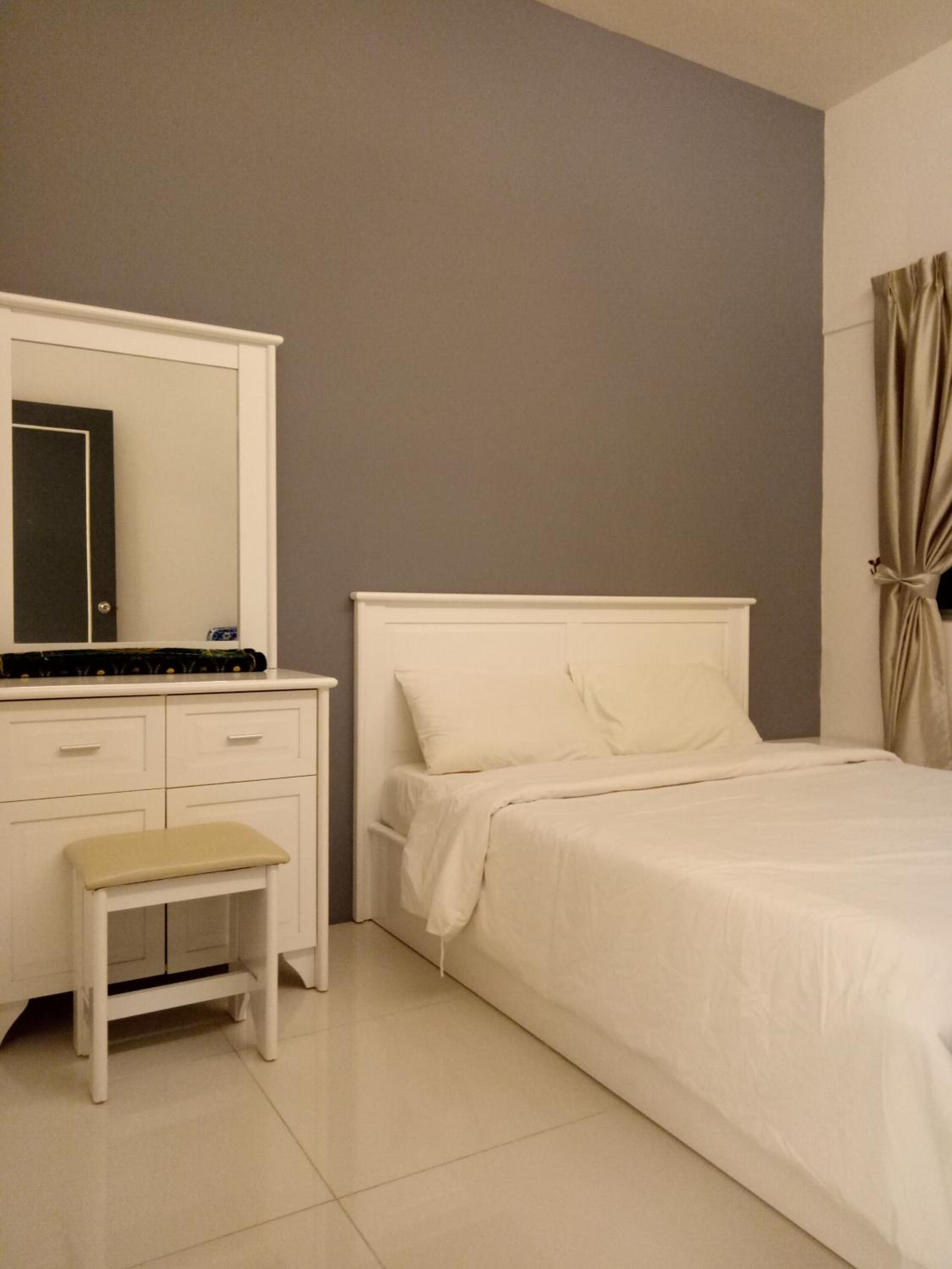 Three-Bedroom Apartment - Photo 14