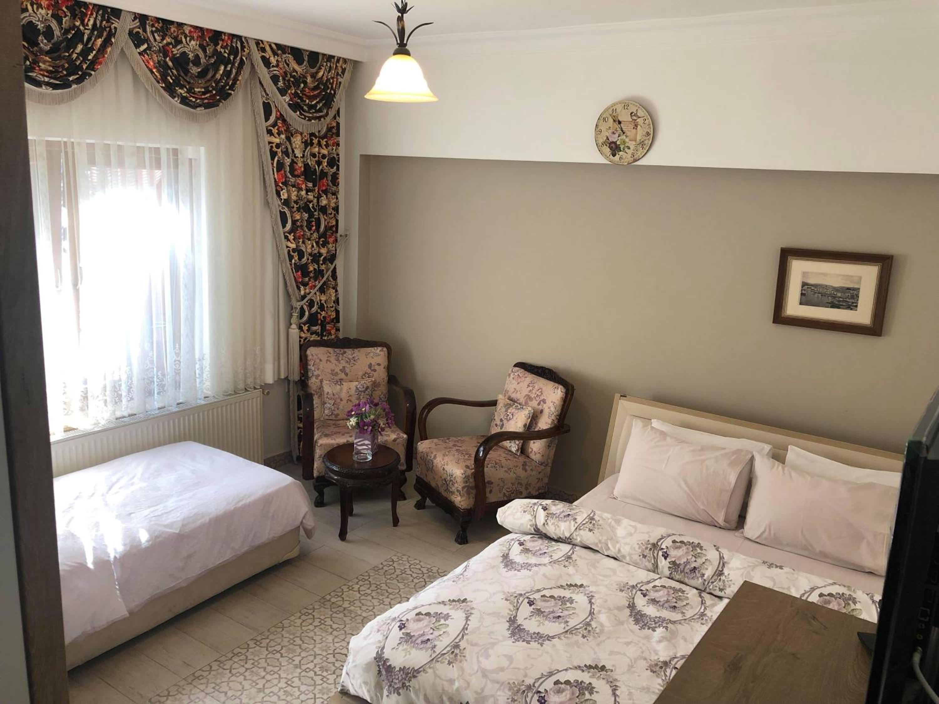 Quadruple Room with Garden View - Photo 1