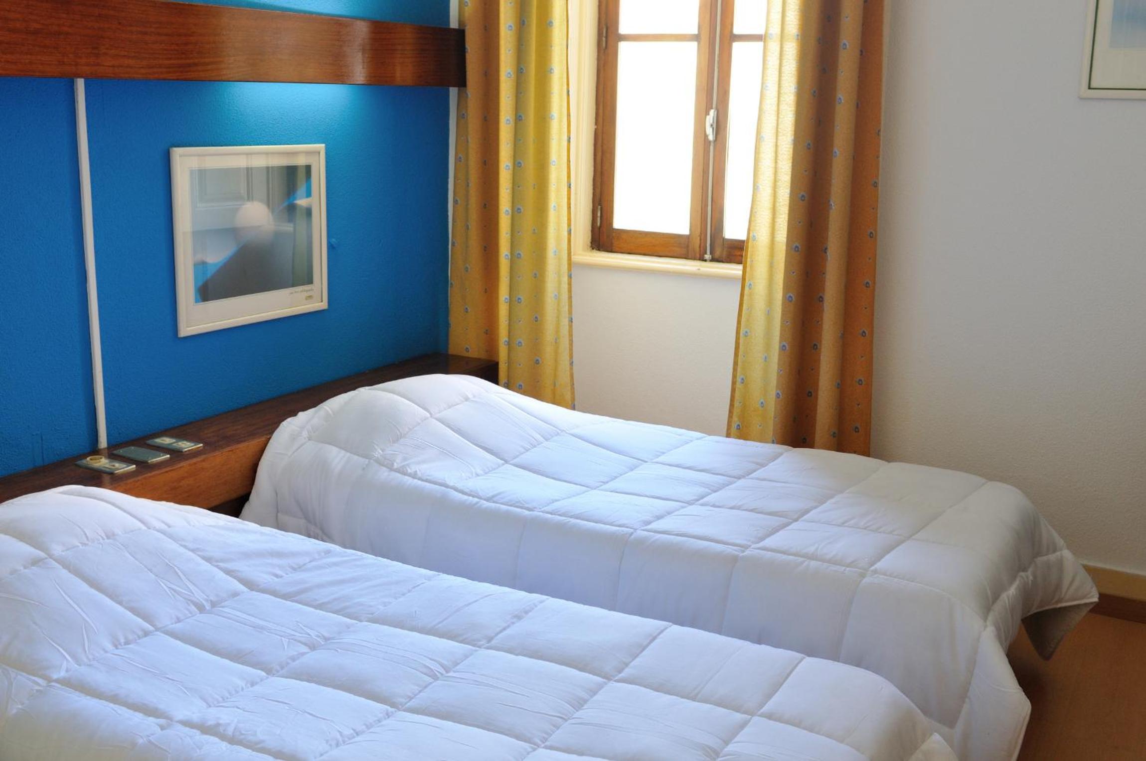 Twin Room - Photo 11