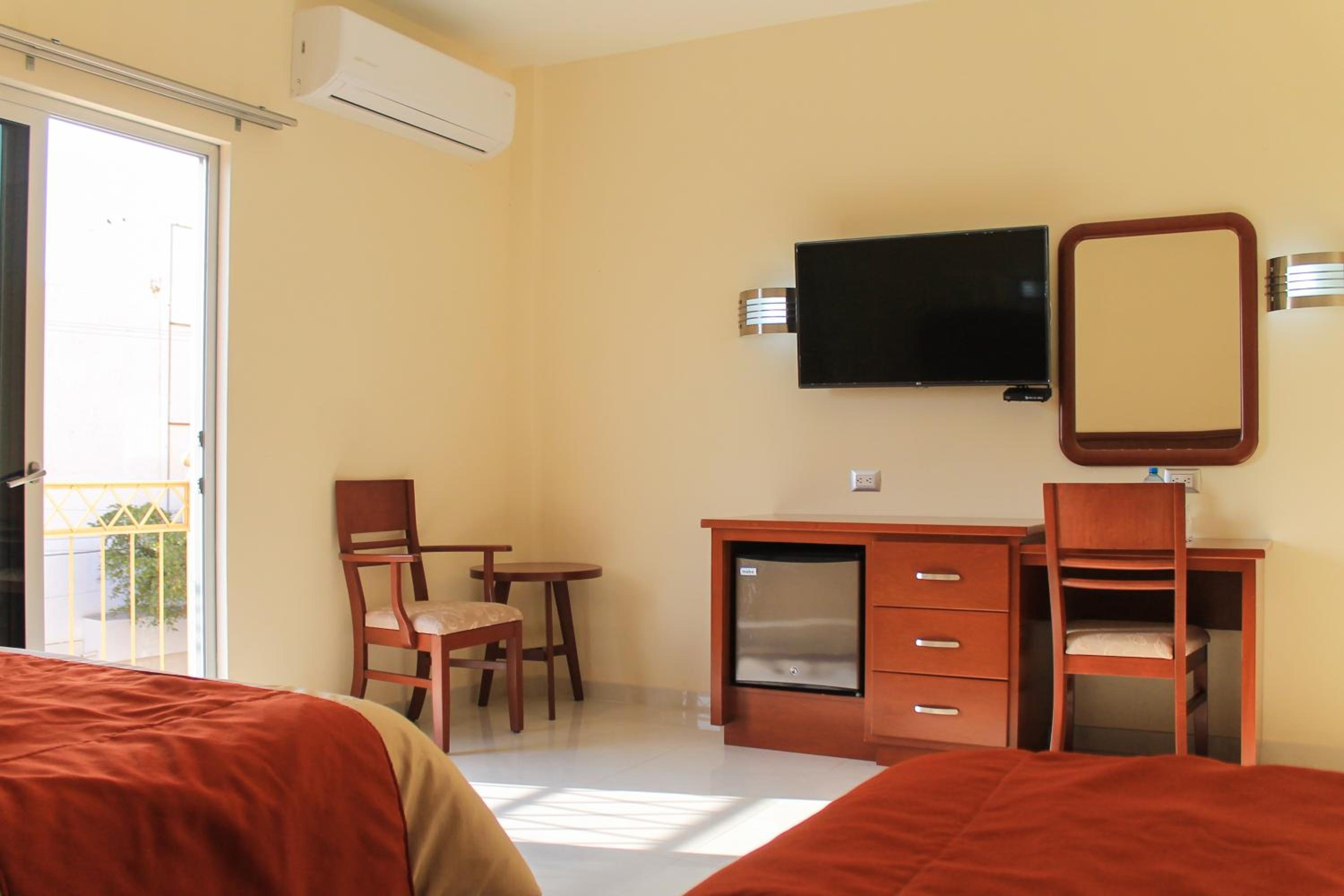 Deluxe Queen Room with Two Queen Beds - Photo 1