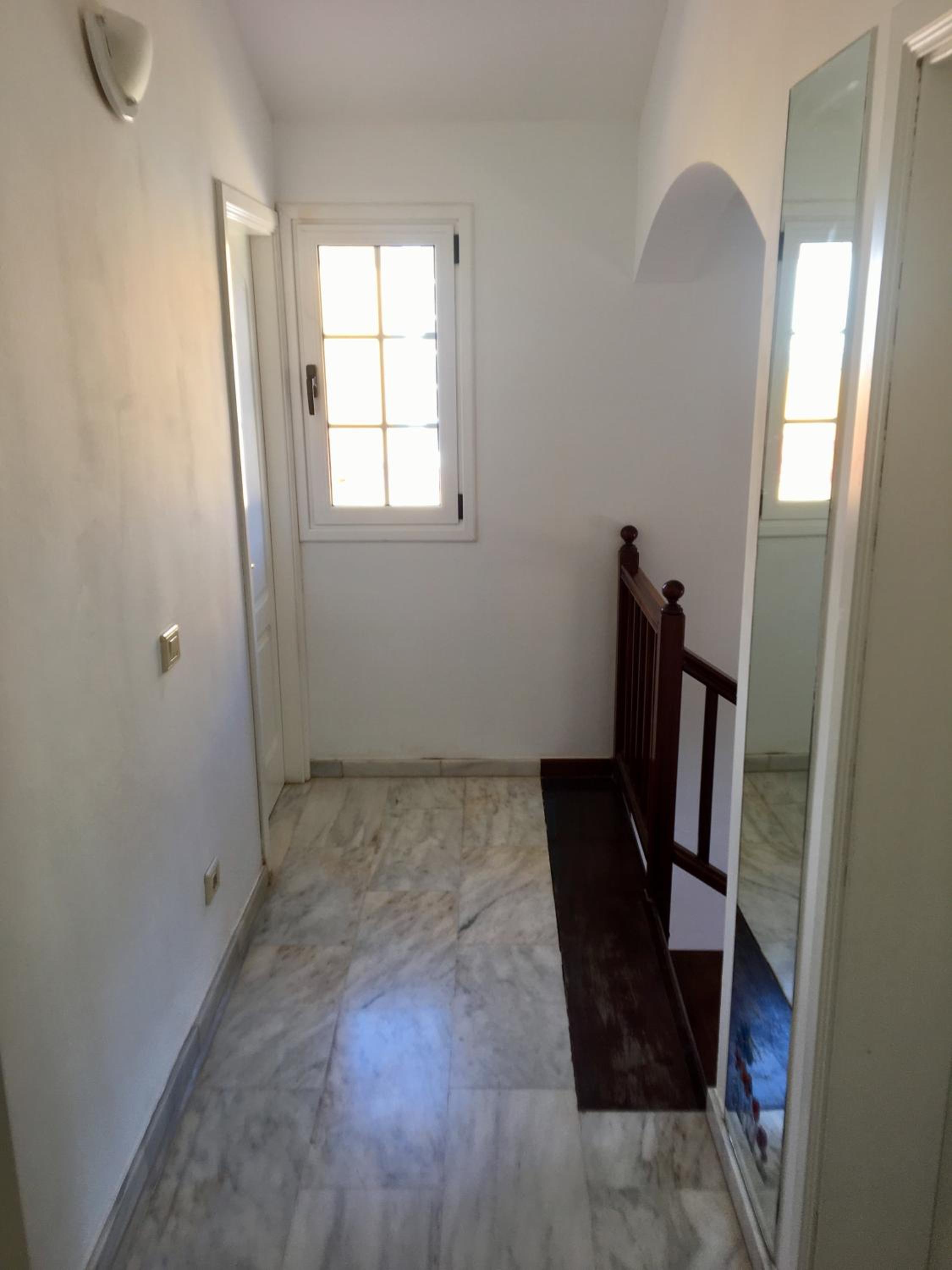 Casa de cuatro habitaciones