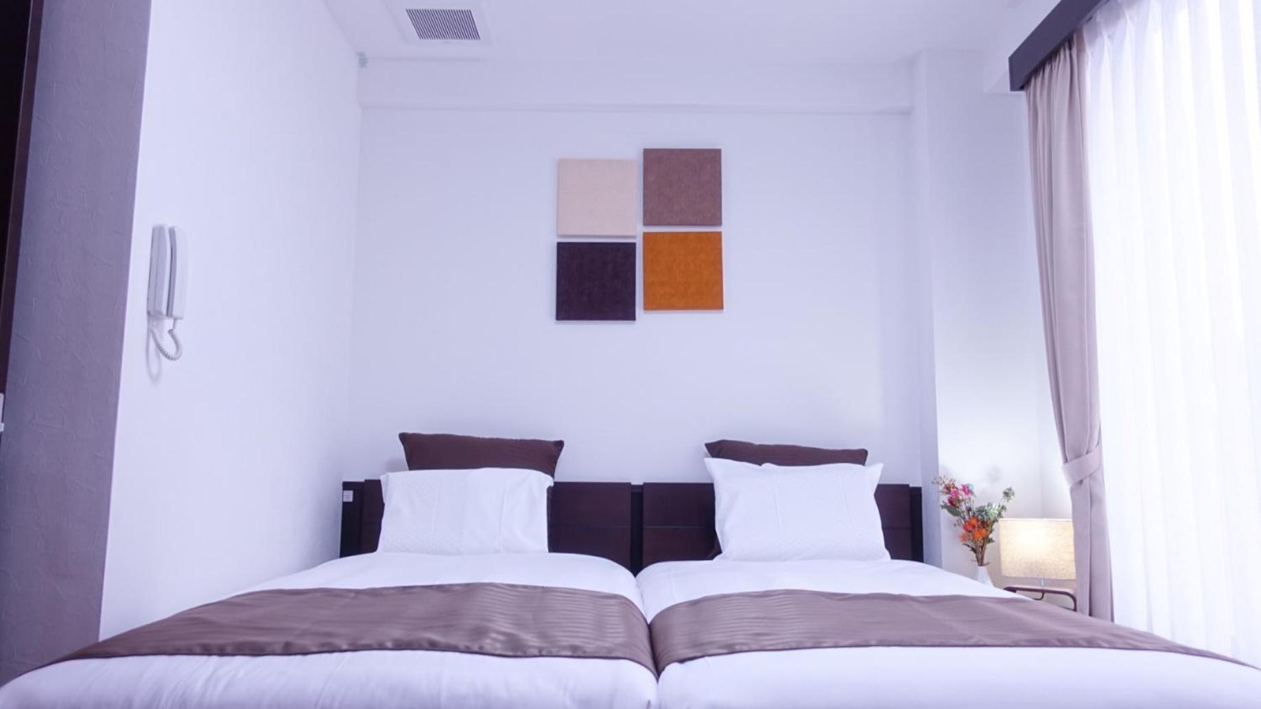 Twin Room - Photo 1