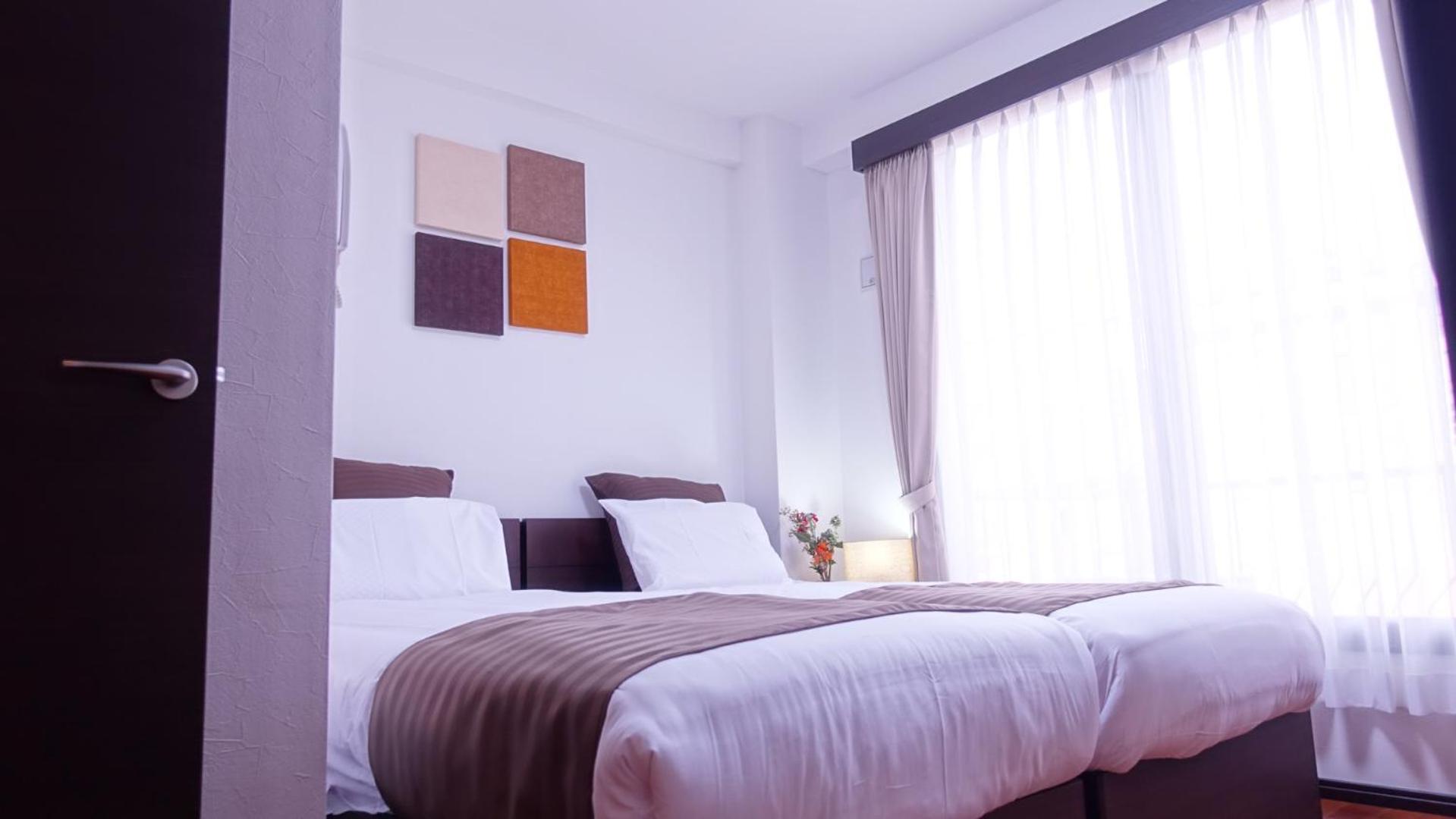 Twin Room - Photo 25