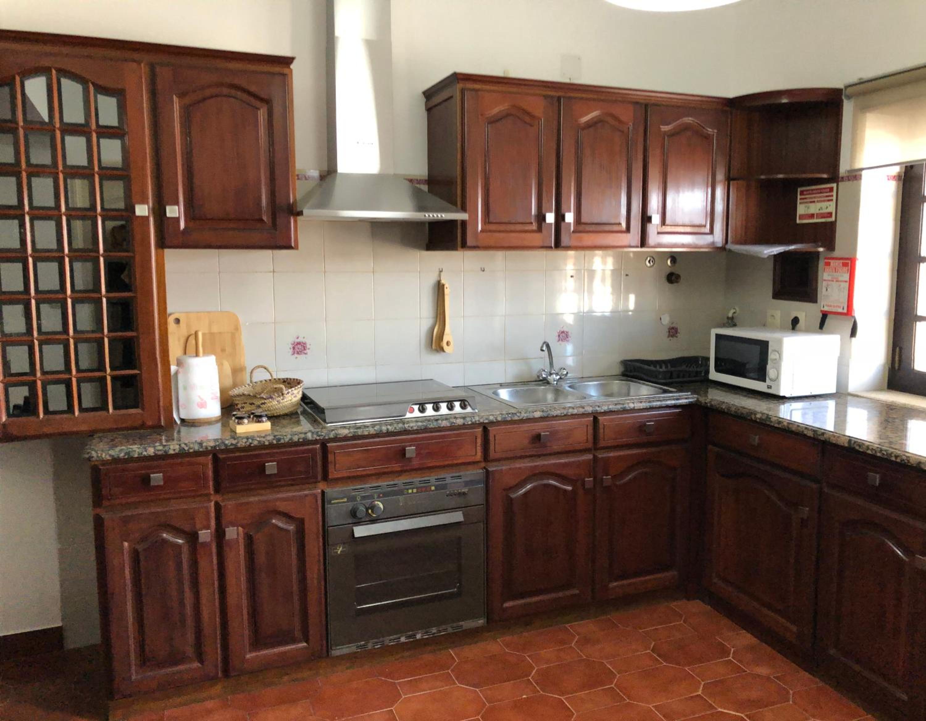 Four-Bedroom House - Photo 25