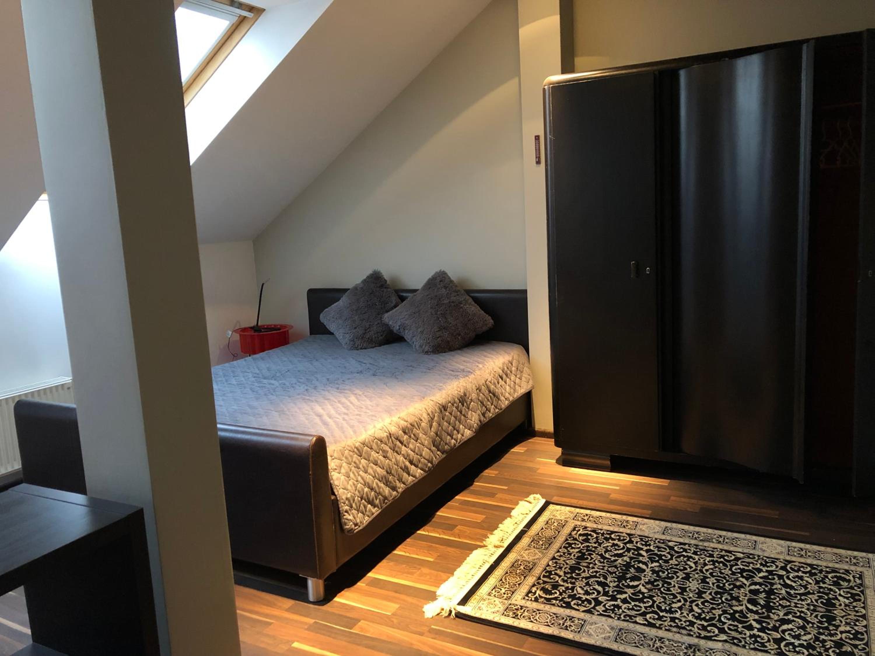 Three-Bedroom Apartment - Photo 11