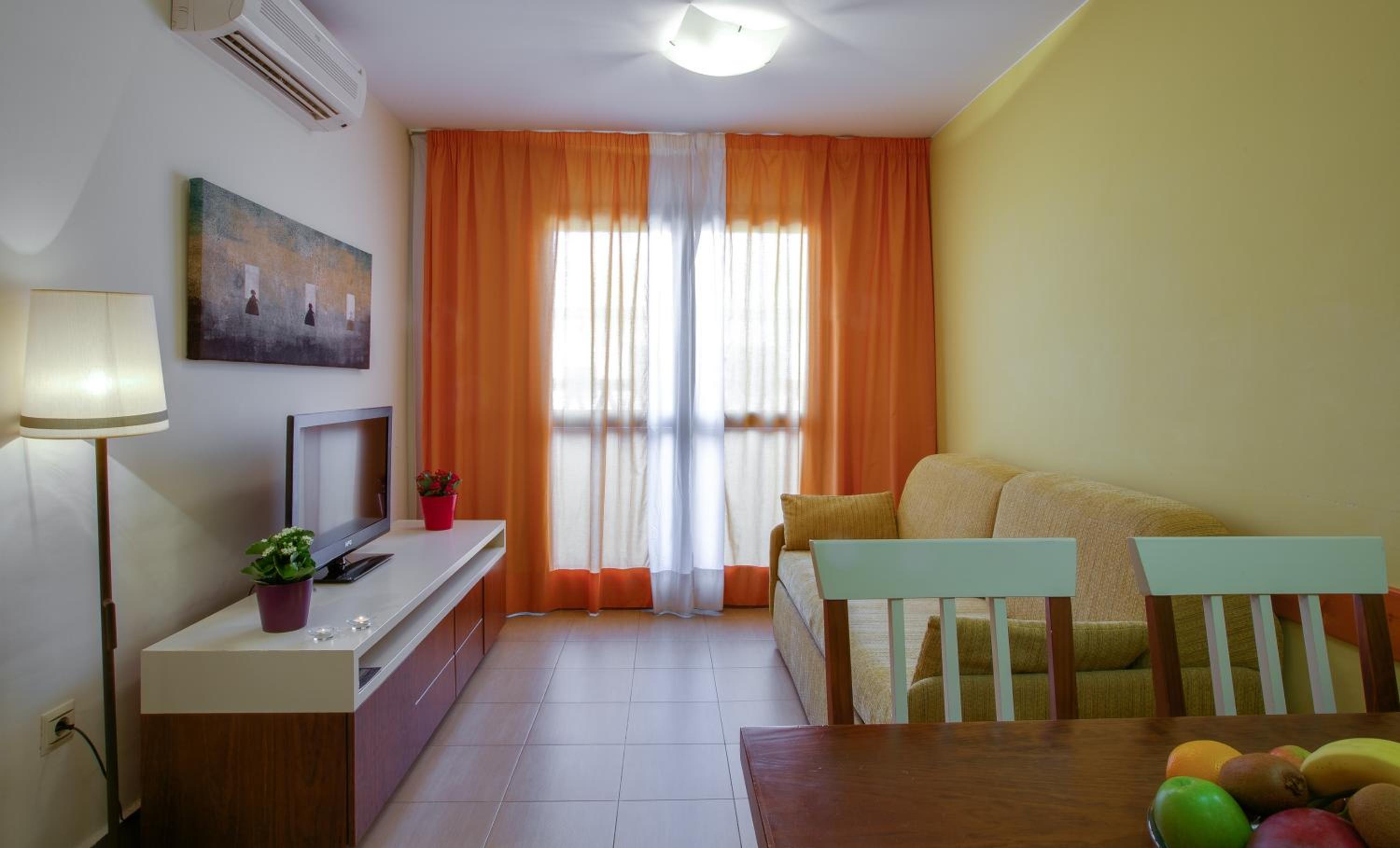 One-Bedroom Apartment - Ground Floor and Front Pool views