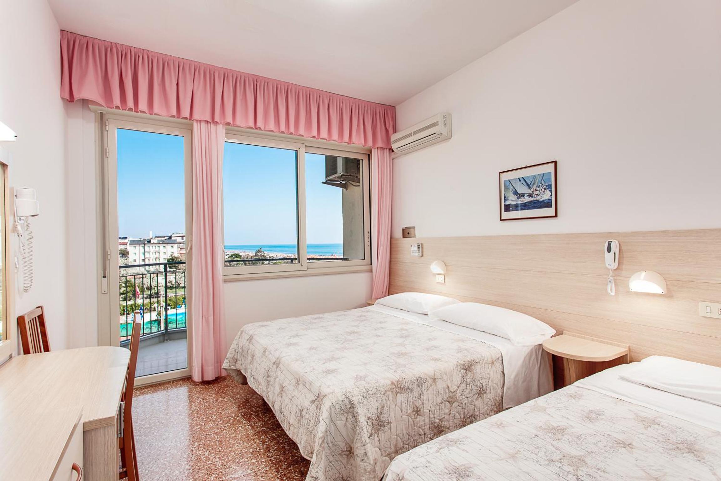 Double or Twin Room with Side Sea View photo 1
