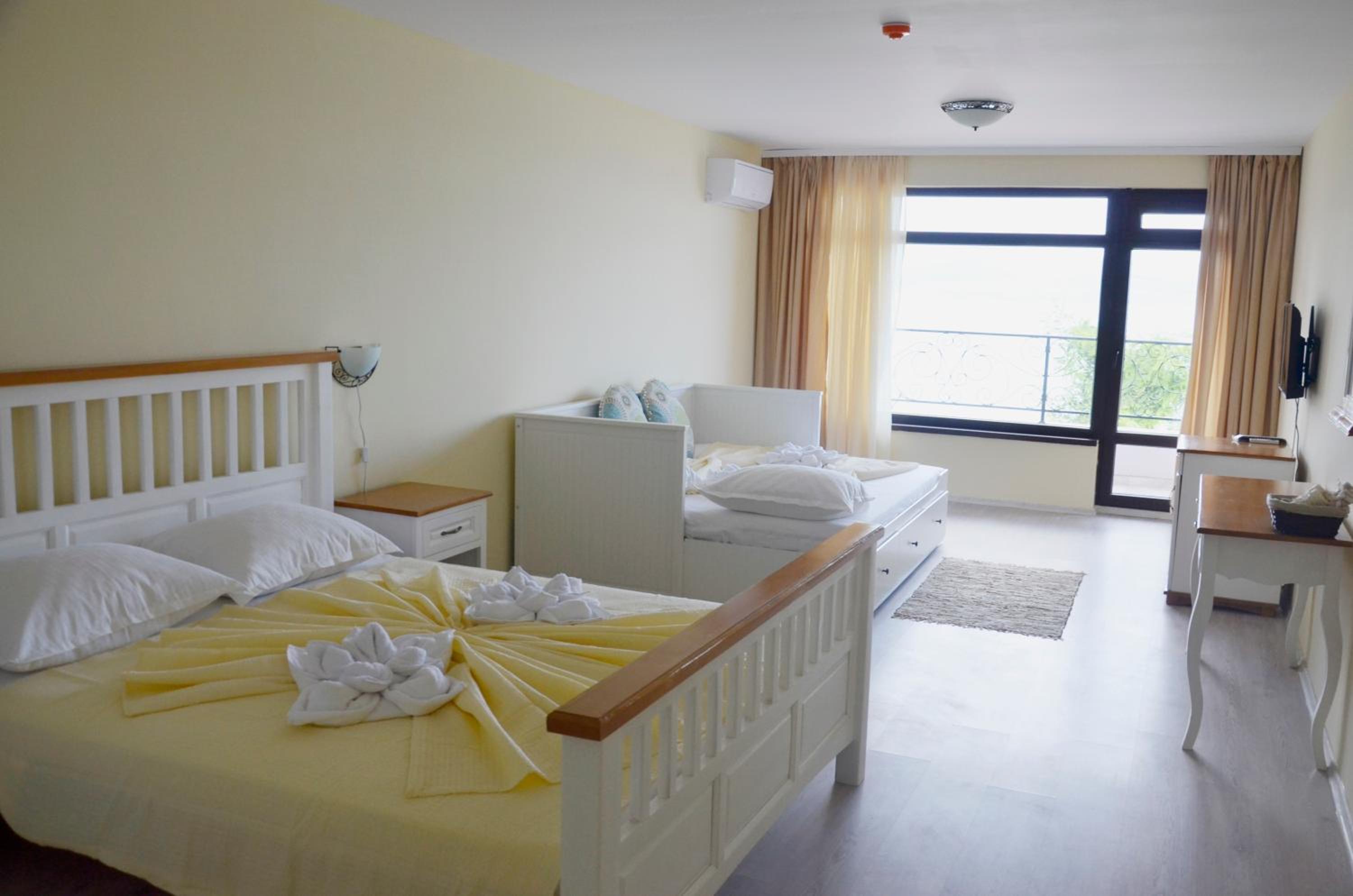 Deluxe Double Room with Sea View (2 Adults + 2 Children)
