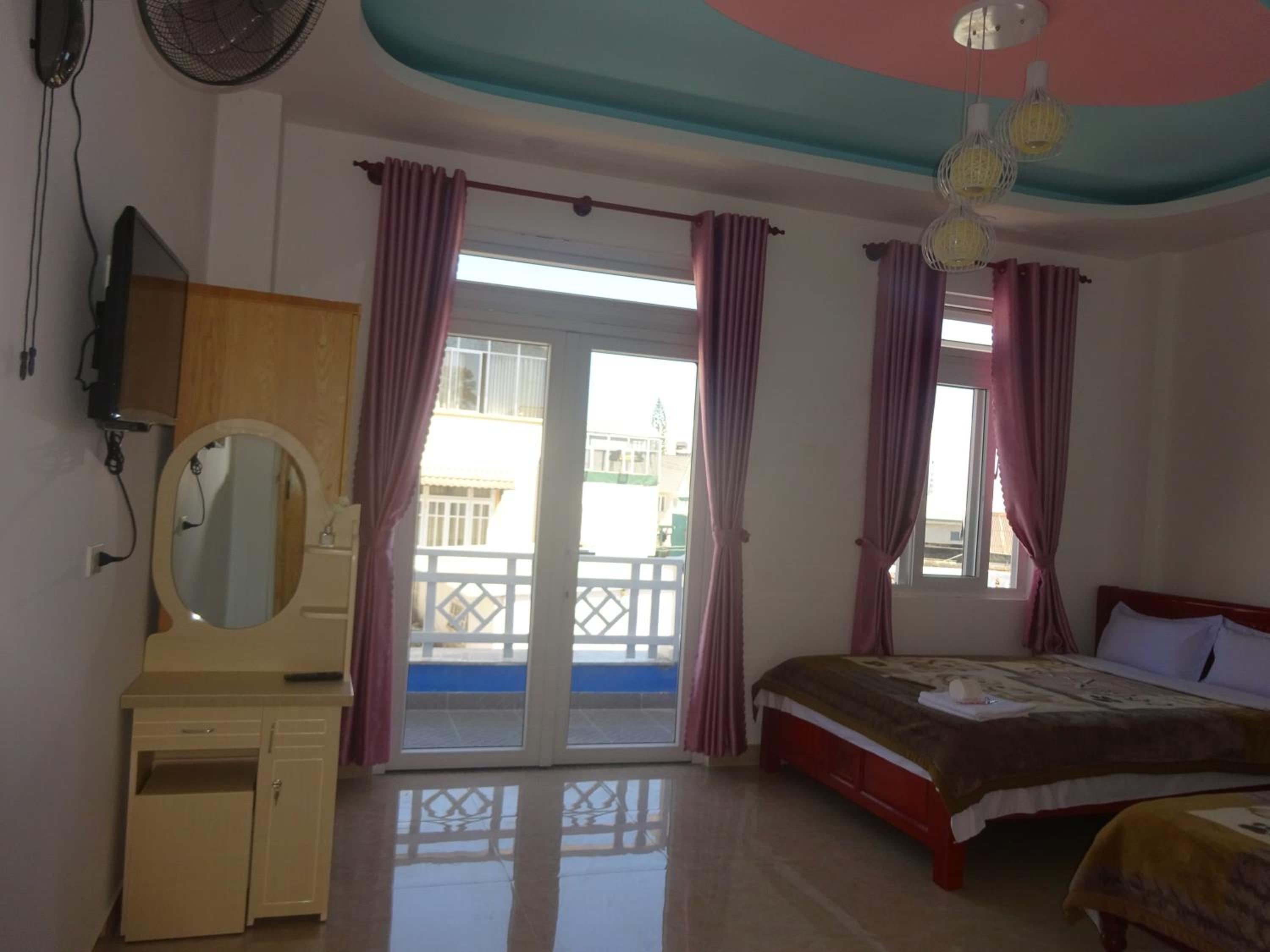 Deluxe Quadruple Room - Photo 14