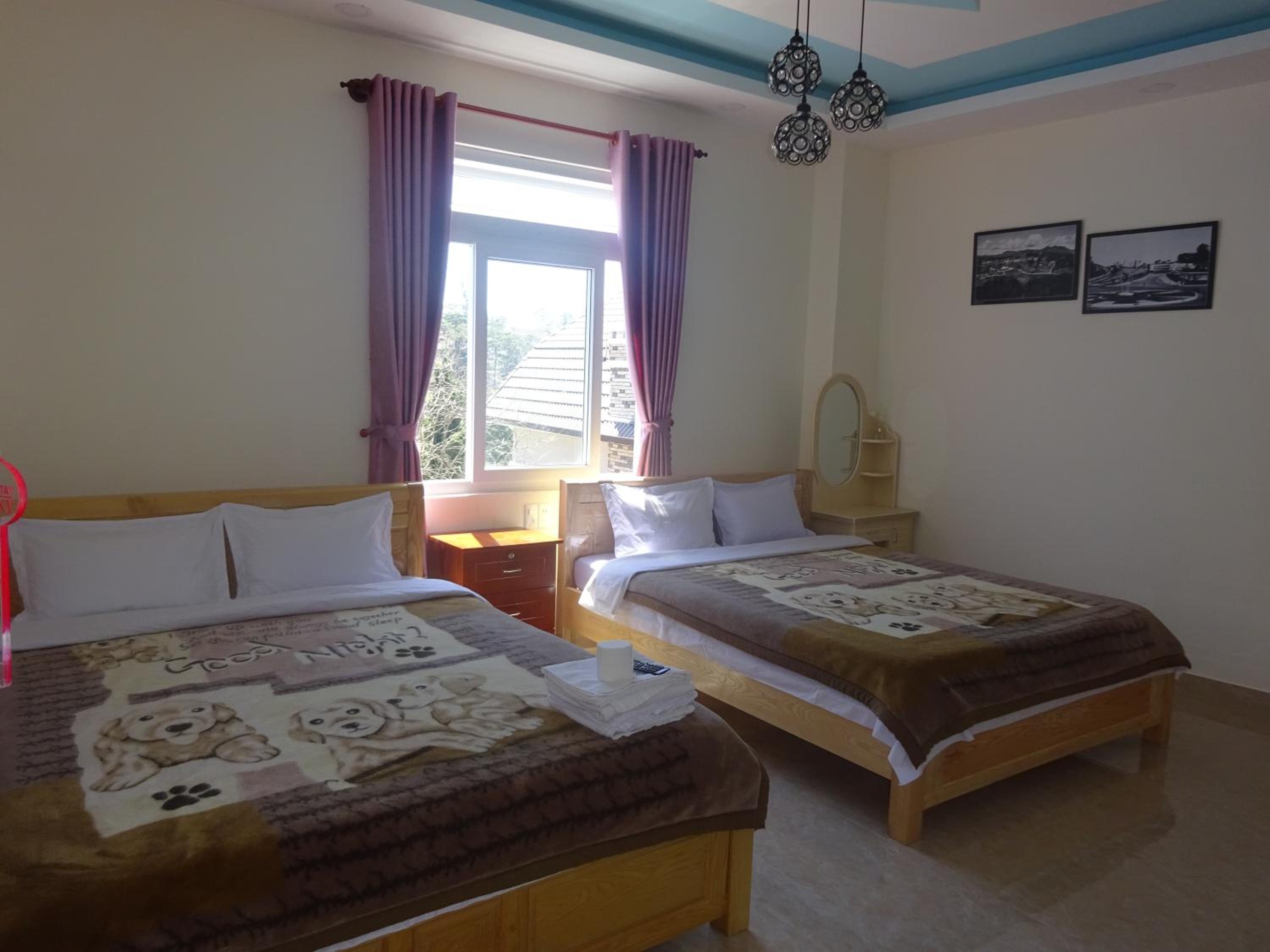 Deluxe Quadruple Room - Photo 13