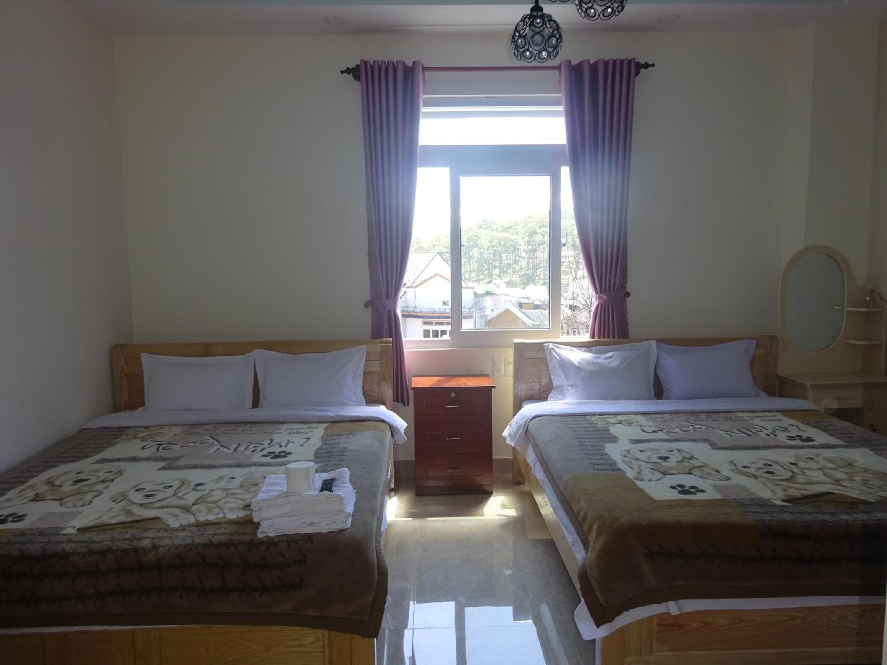 Deluxe Quadruple Room - Photo 15