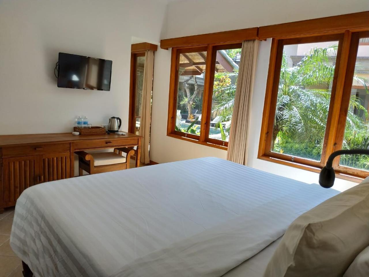 Deluxe Room (2 Adults + 1 Child) - Photo 4