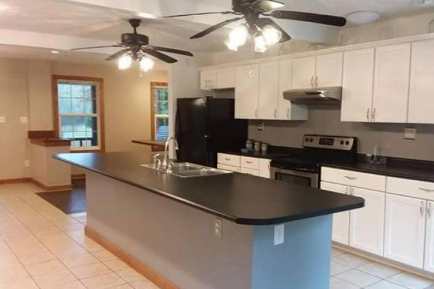 Three-Bedroom House - Photo 3
