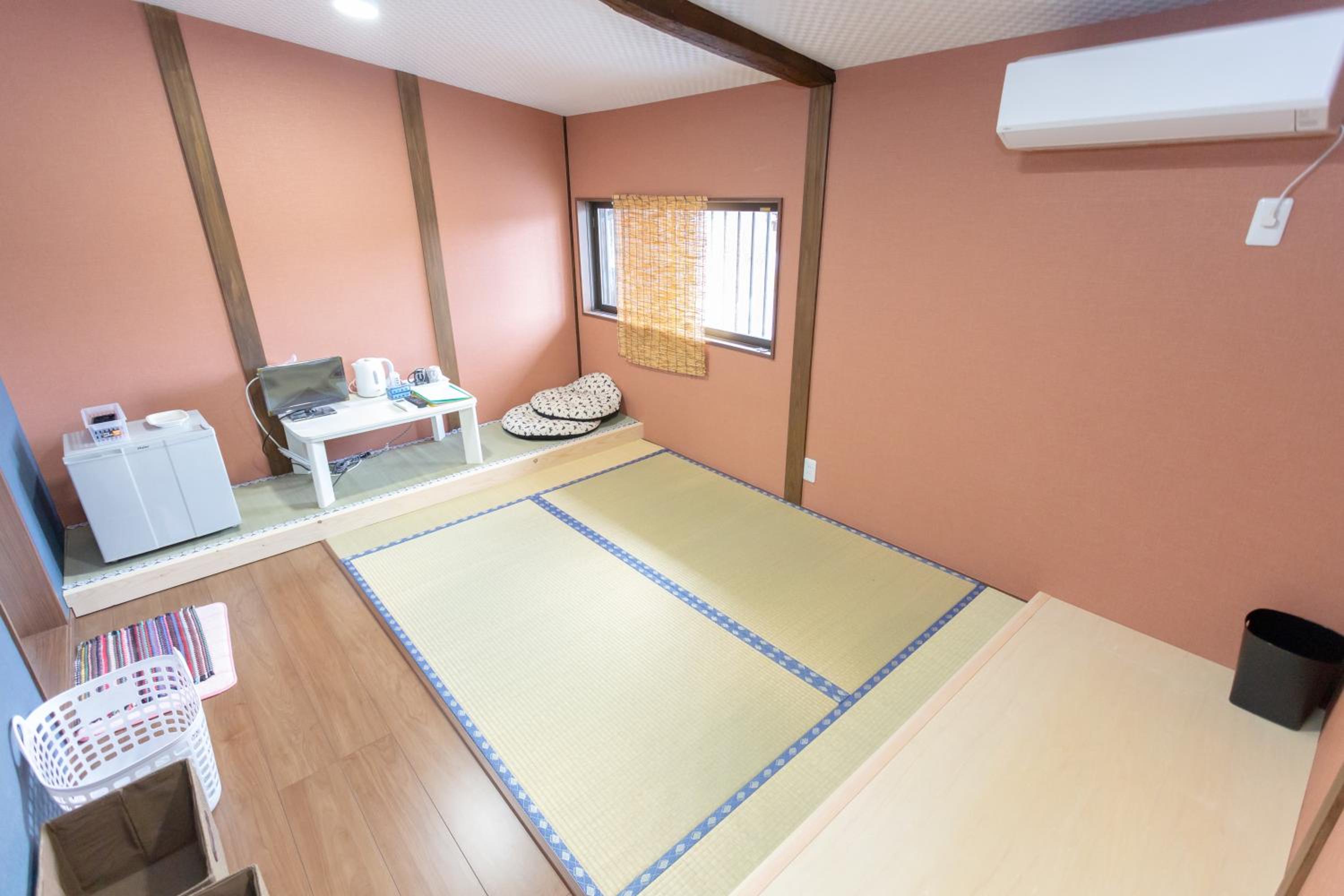 Three-Bedroom House - Photo 60