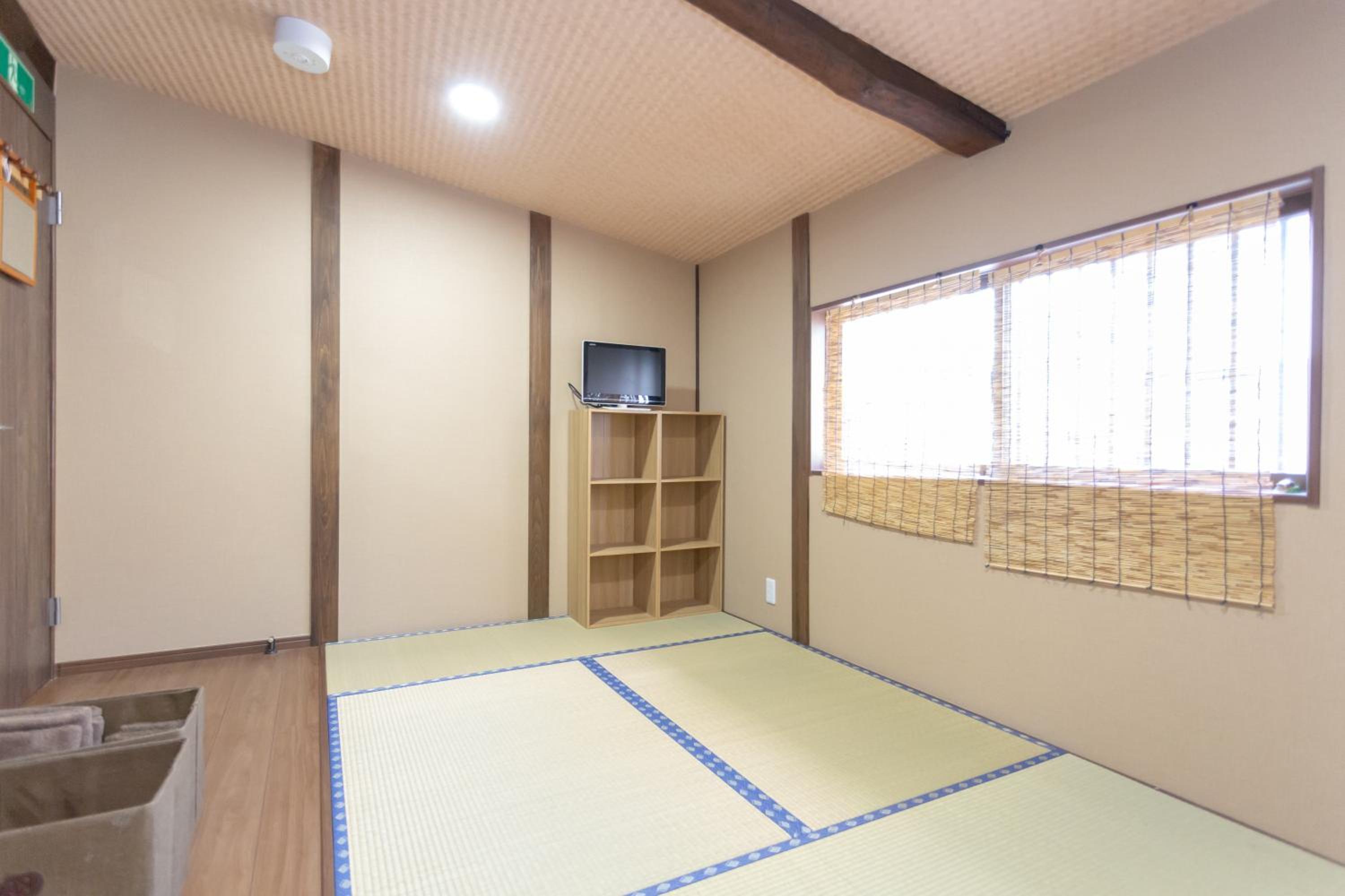 Three-Bedroom House - Photo 75