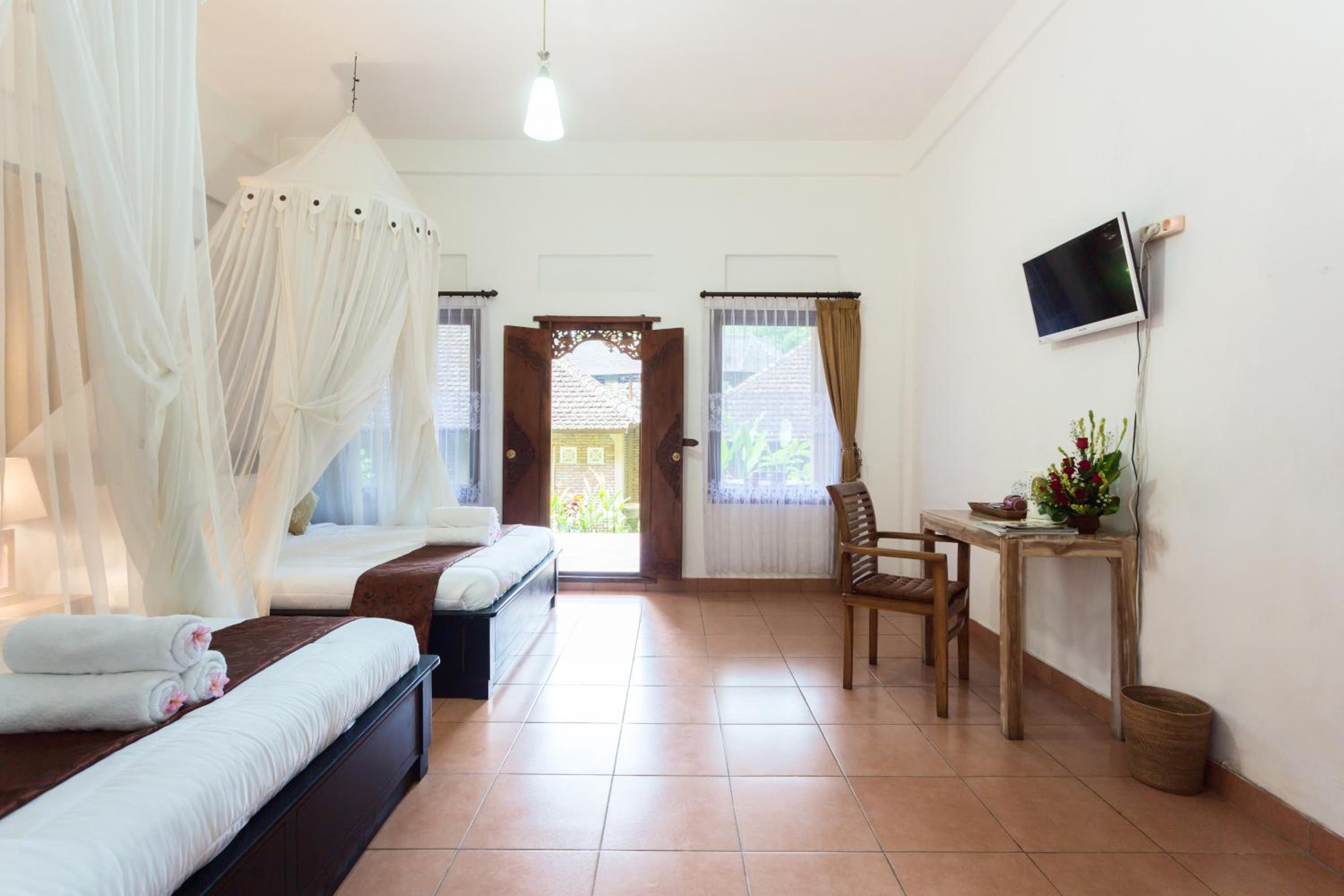 Deluxe Quadruple Room - Photo 7