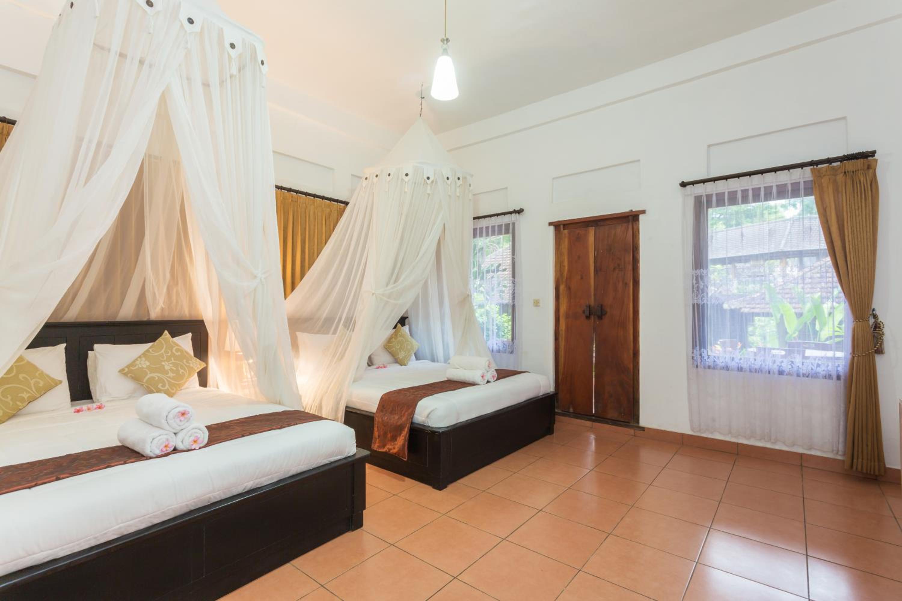 Deluxe Quadruple Room - Photo 6