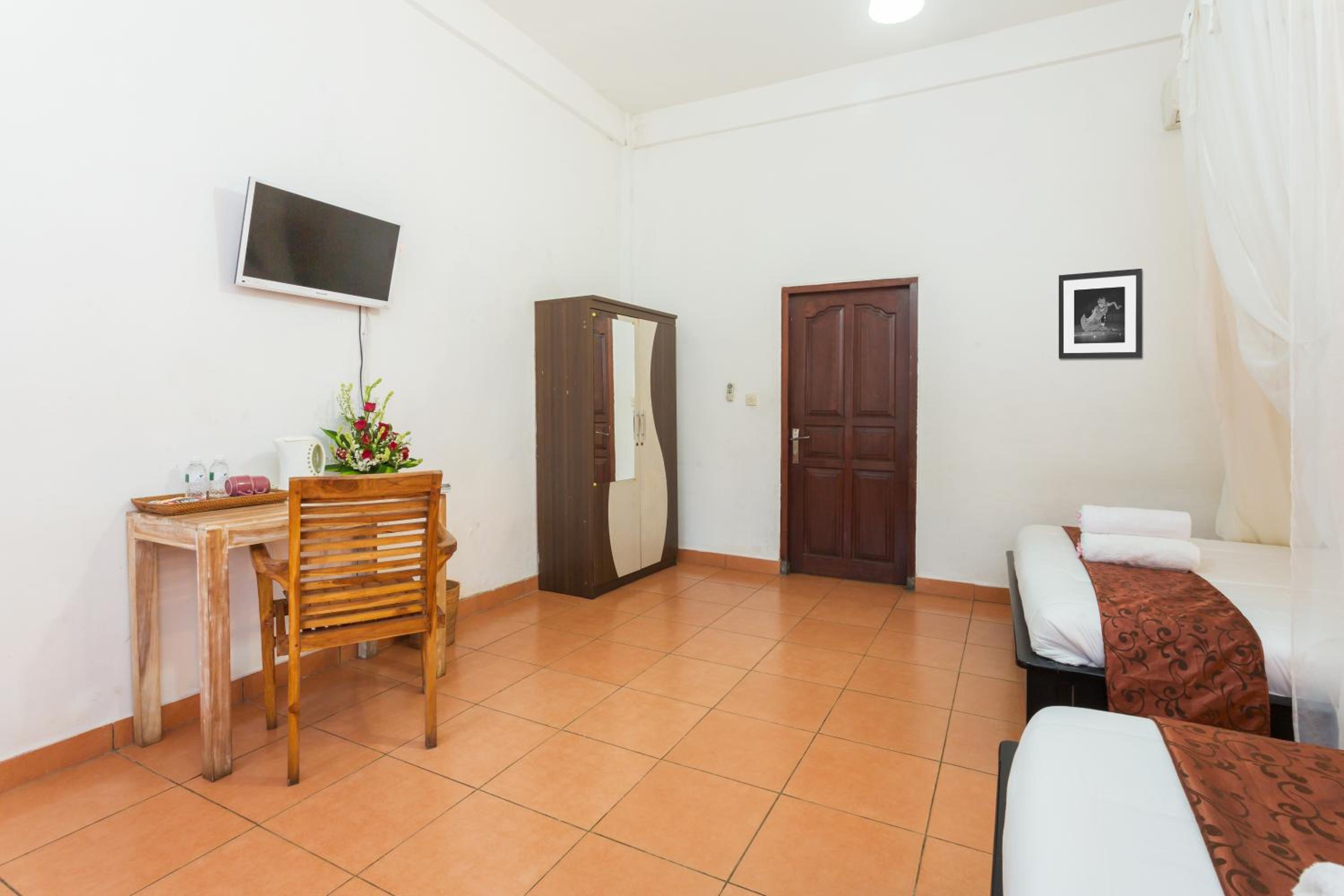 Deluxe Quadruple Room - Photo 9