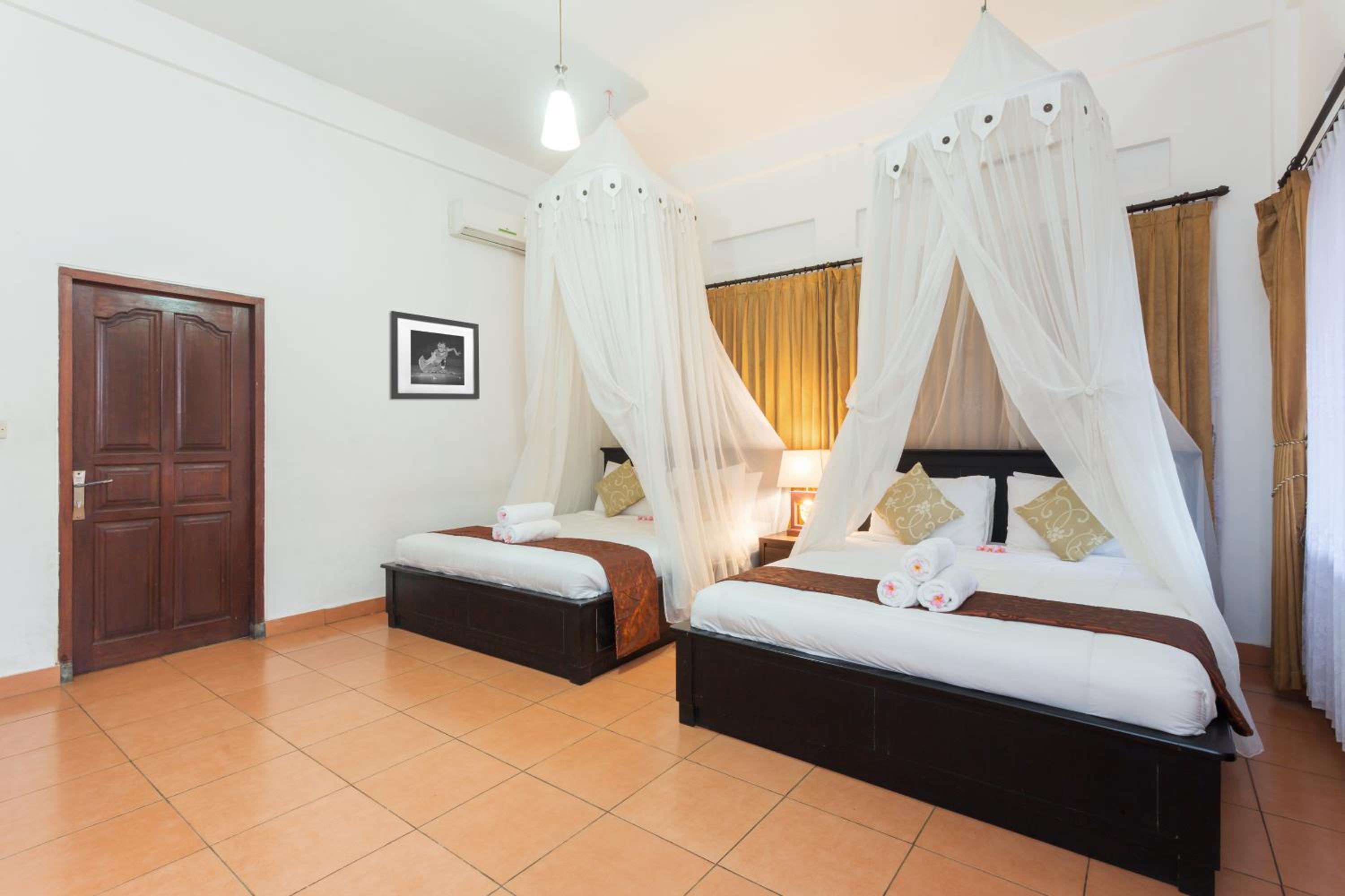 Deluxe Quadruple Room - Photo 5