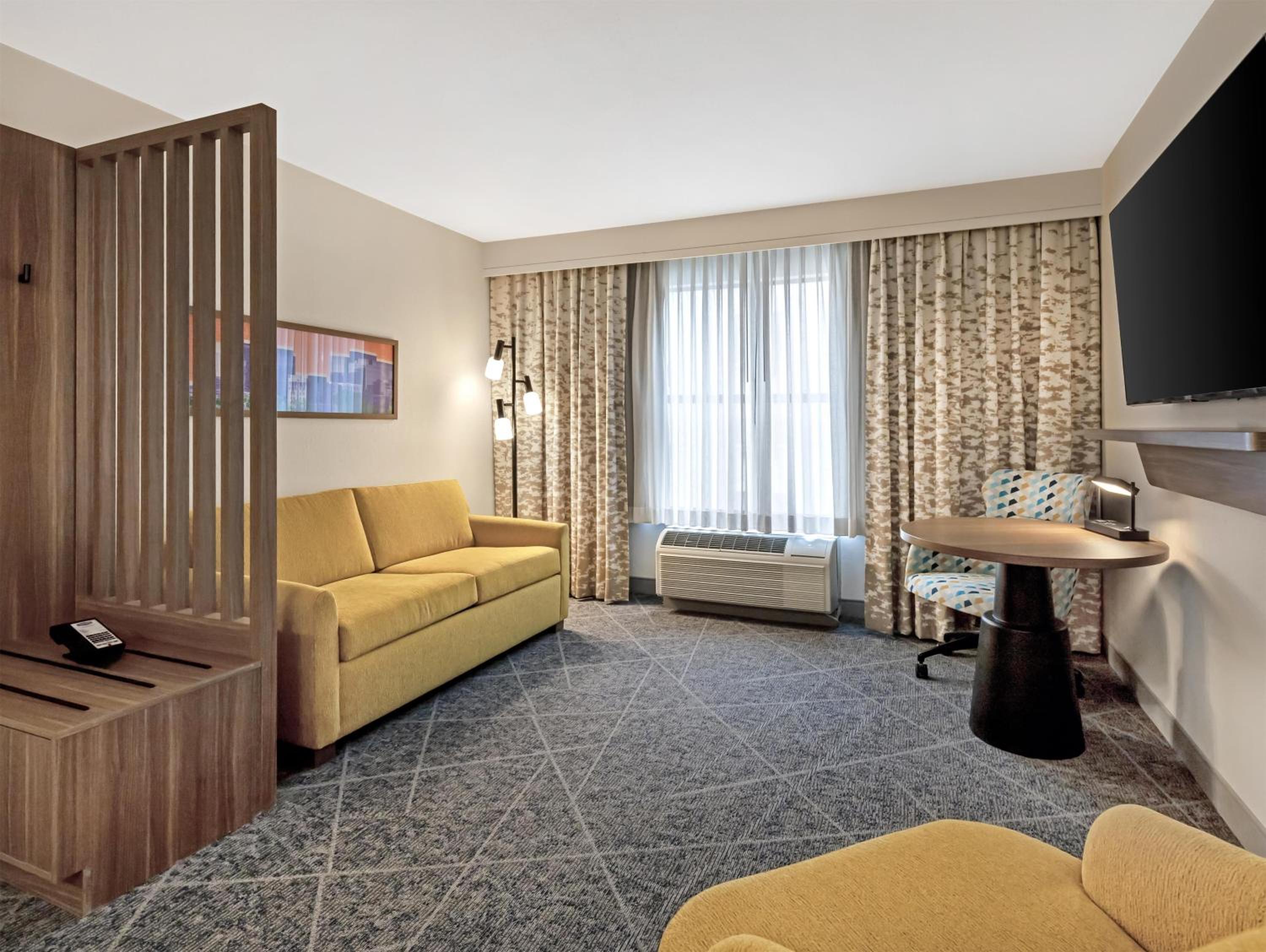 King Suite with One King Bed, Shower, Wet Bar and Pool View - Non-Smoking