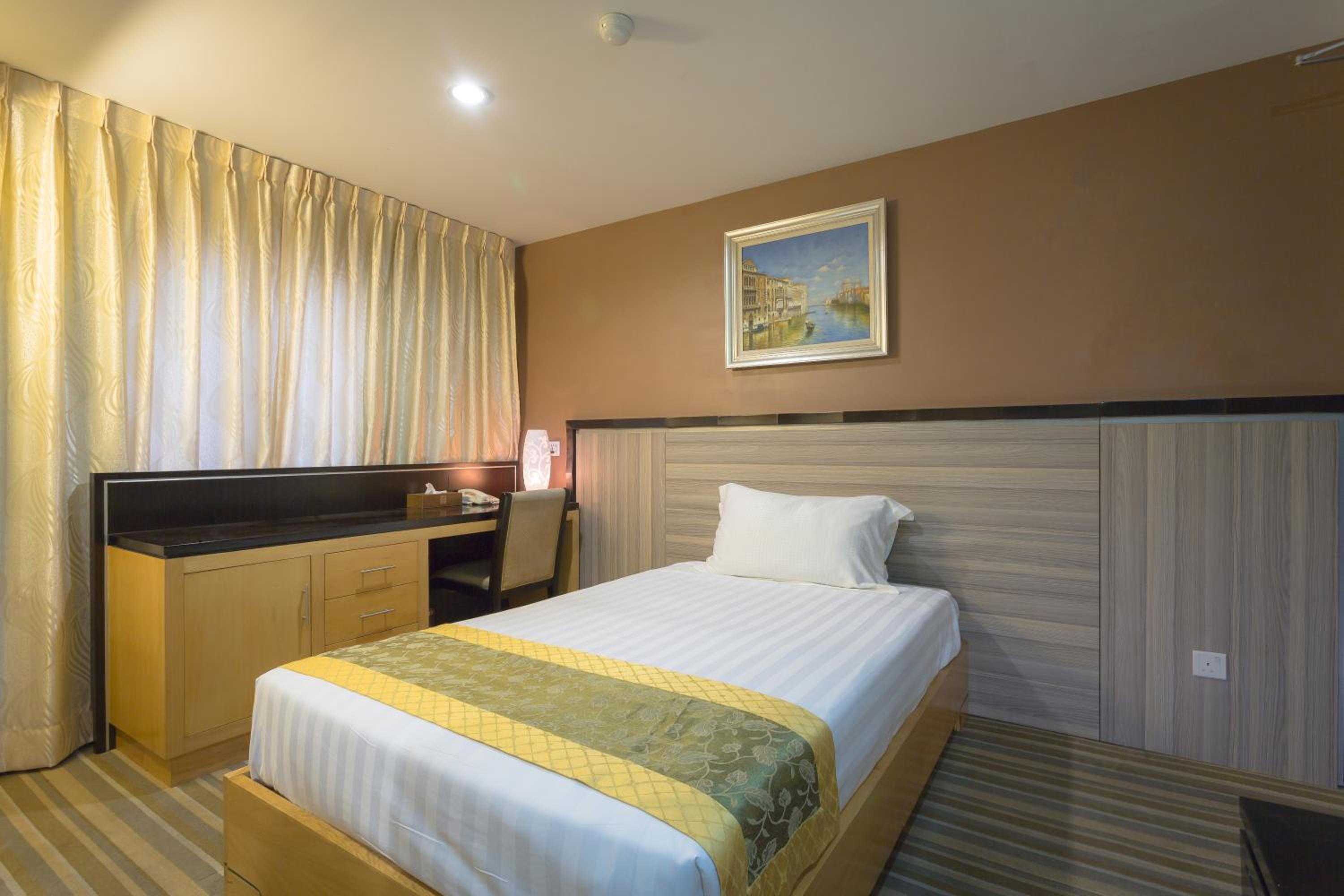 Deluxe Single Room - Photo 1