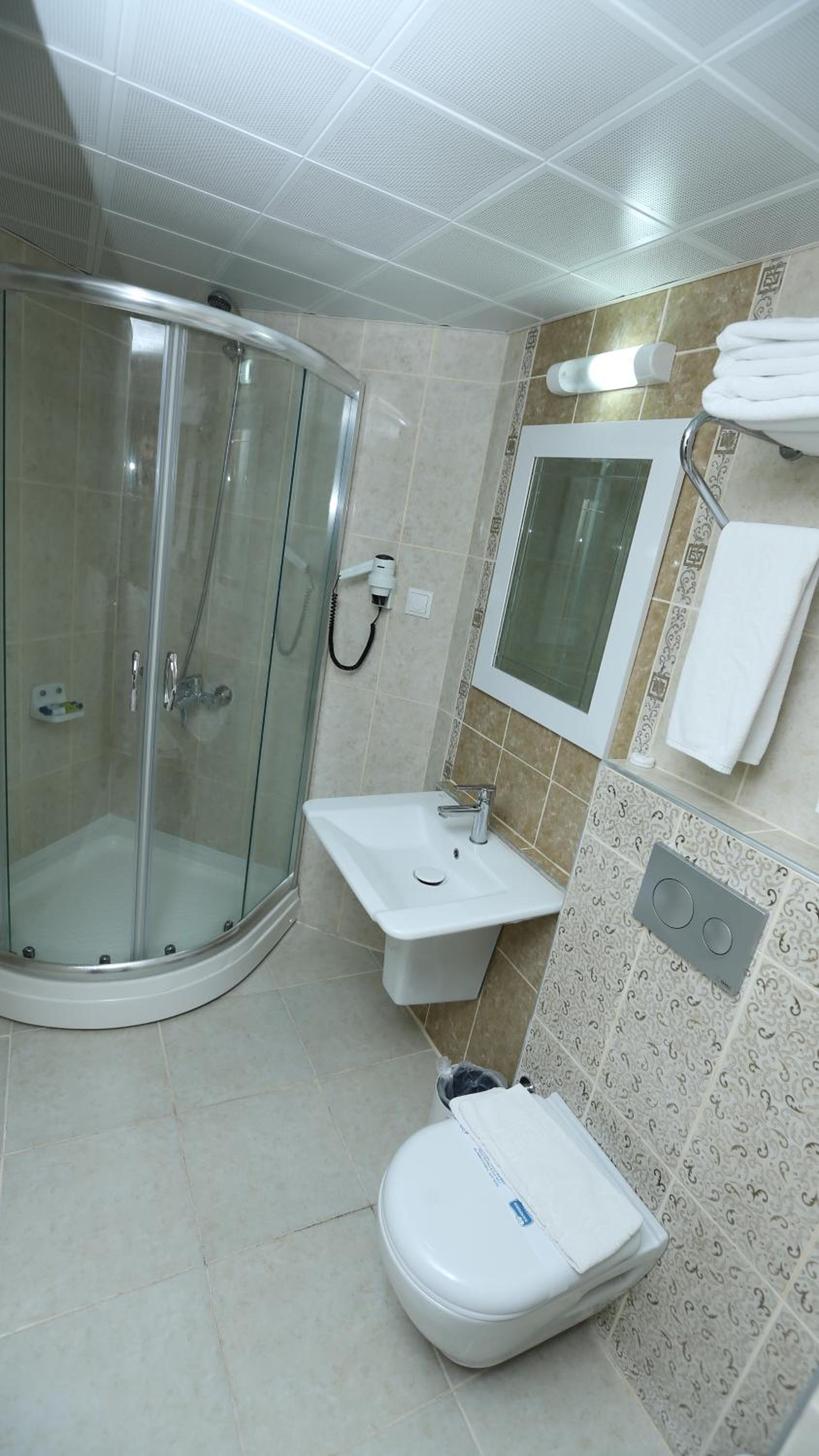 Standard Triple Room with Side Sea View