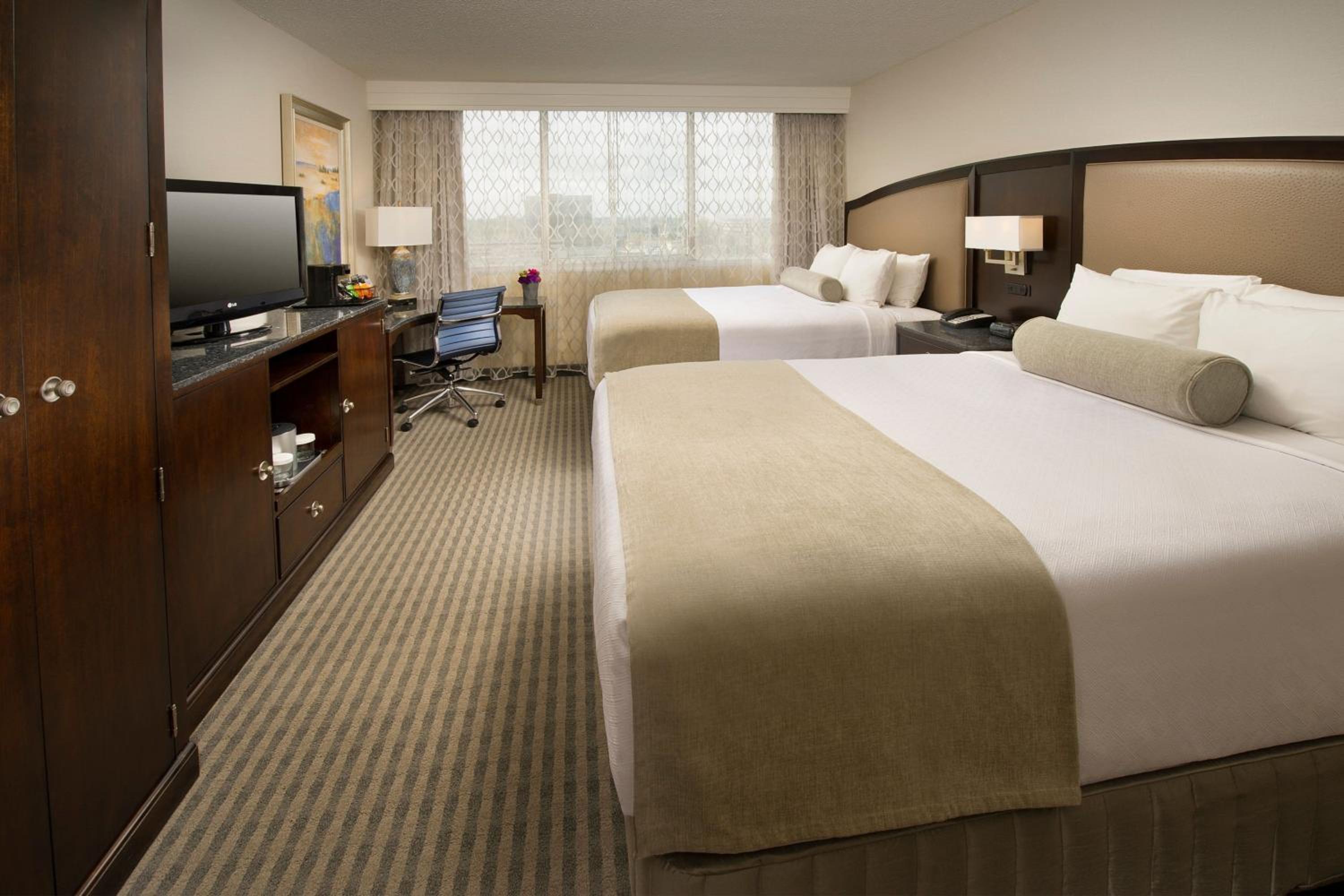 Queen Room with Two Queen Beds - Hearing Accessible photo 1