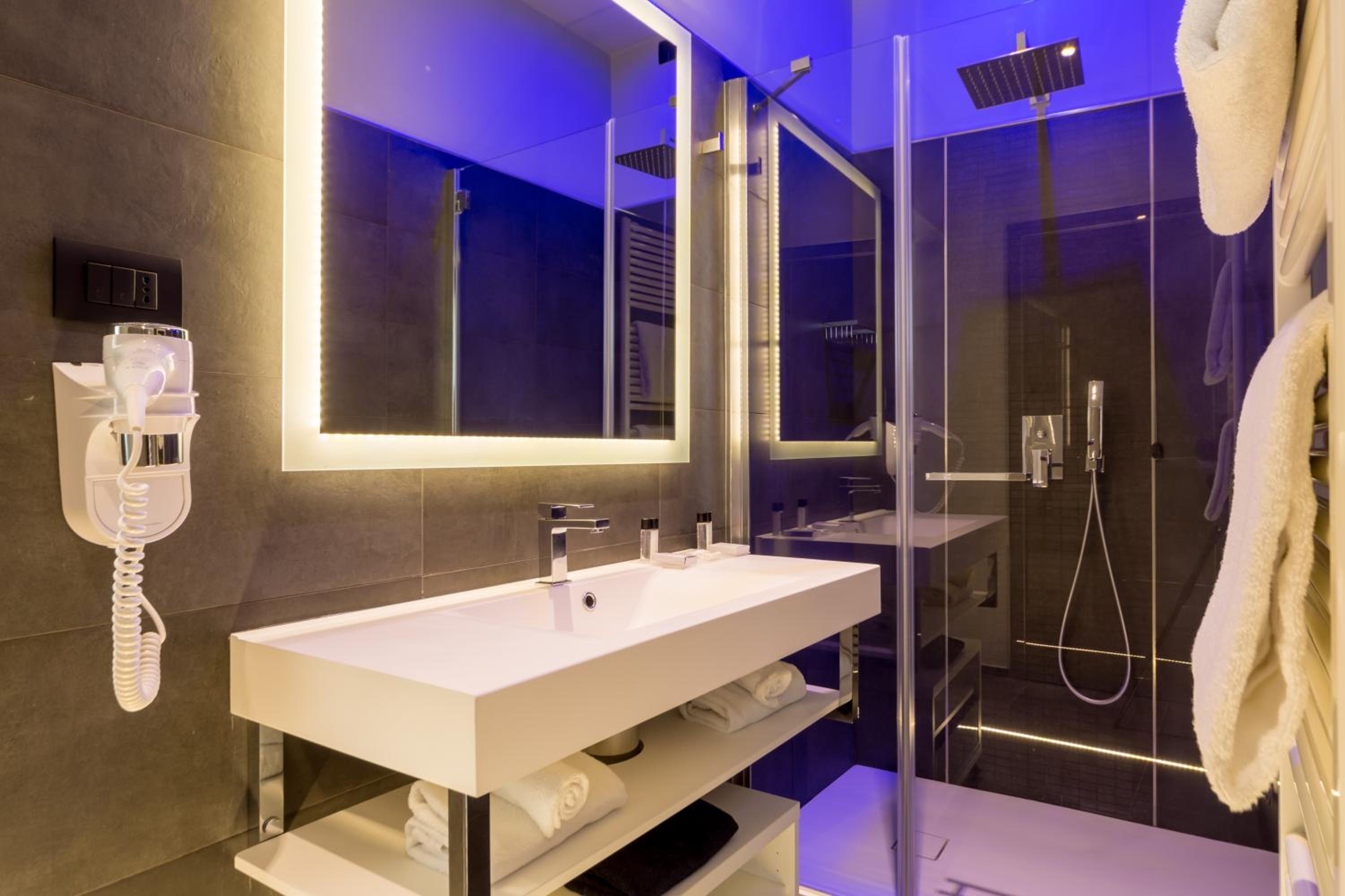 Experience modern luxury in our beautifully designed bathrooms.