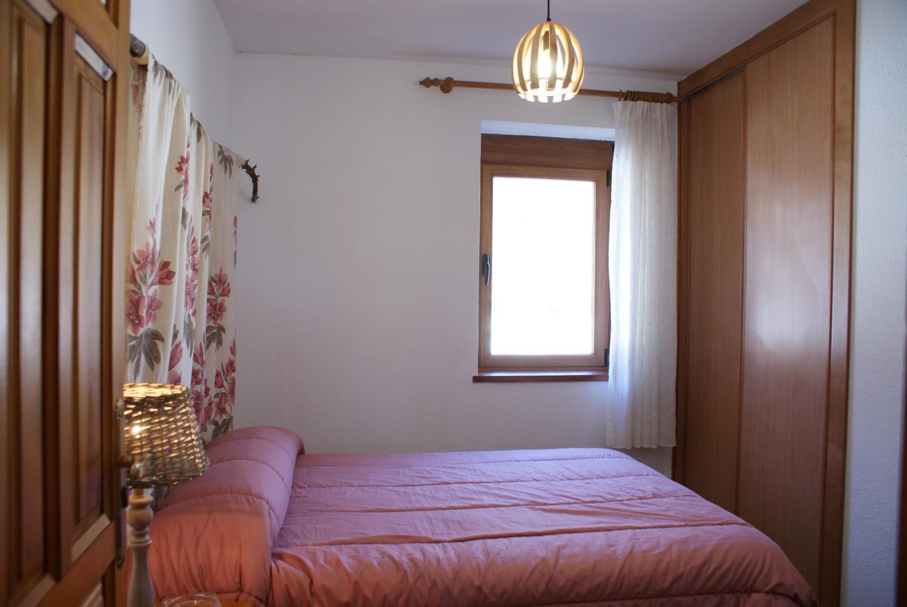 Habitación Queen con Baño Compartido
