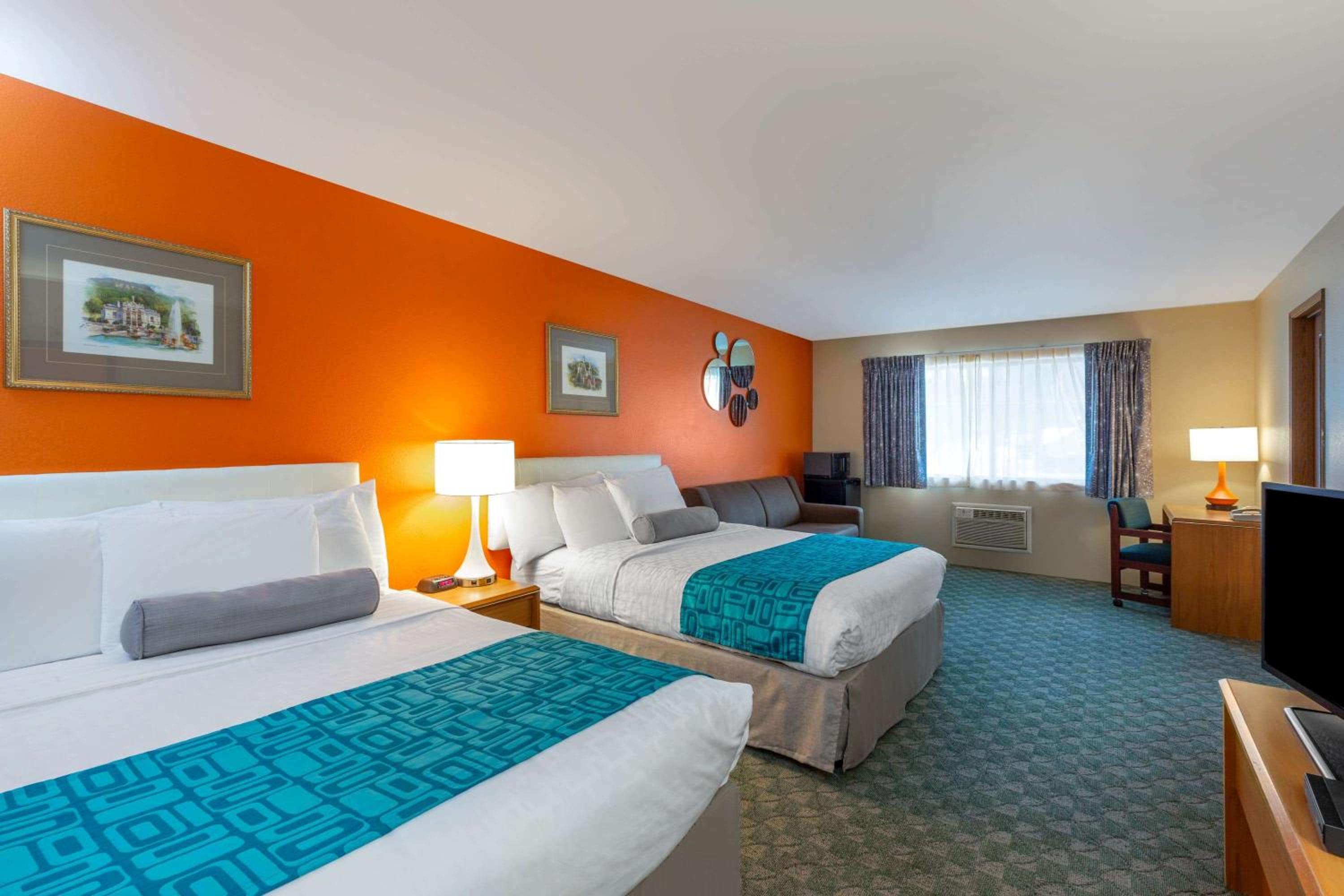 Deluxe Queen Room with Two Queen Beds (No Pets) - Photo 1